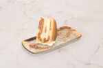 View Salted Caramel Vanilla Crunch Cake Plating
