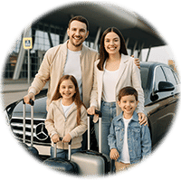 Family with luggage in front of a Mercedes at the airport