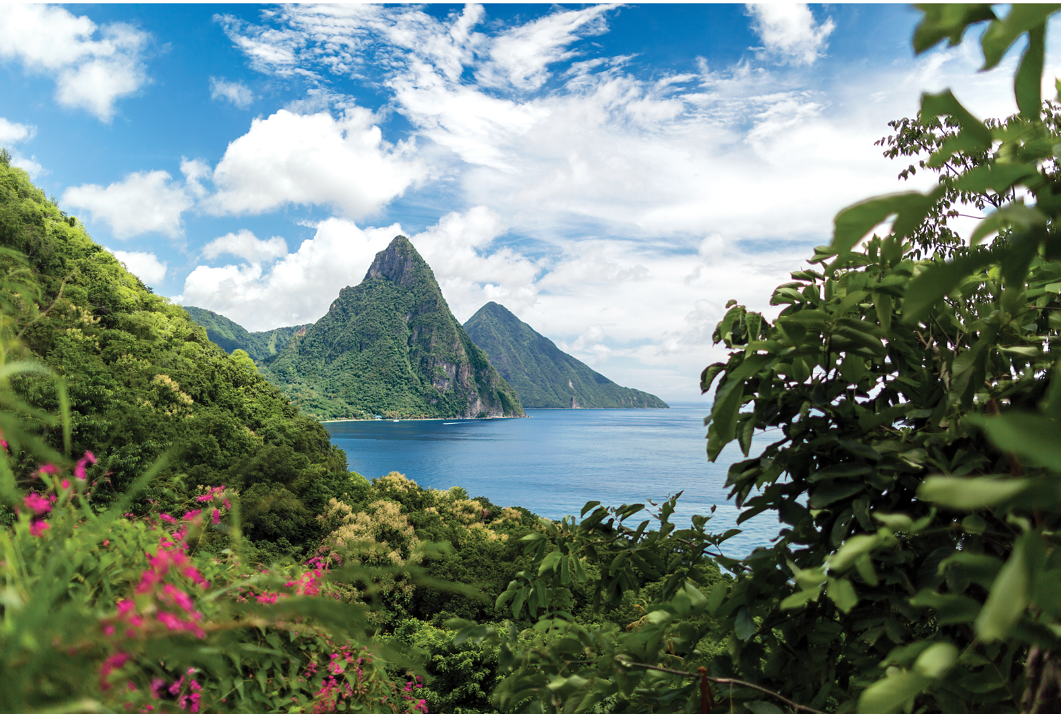 Eastern Caribbean cruise destination featuring St. Lucia's Pitons, lush mountains, and blue coastal water