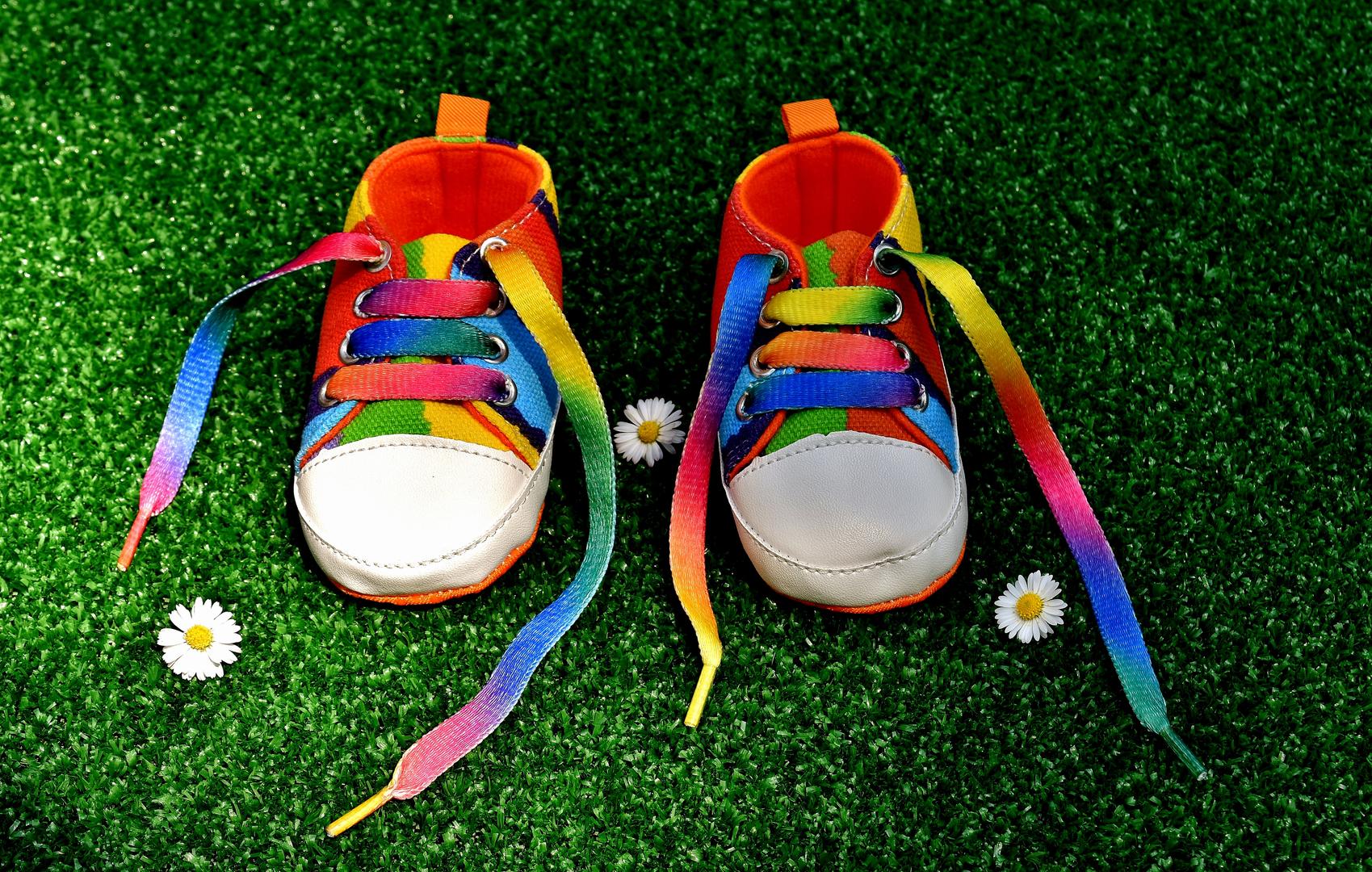 Kid's shoes on artificial grass