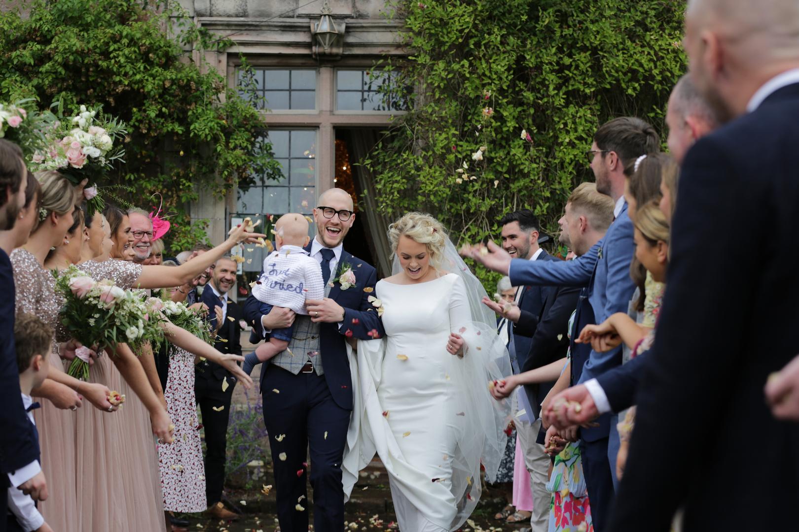 Bride and groom with lots of people