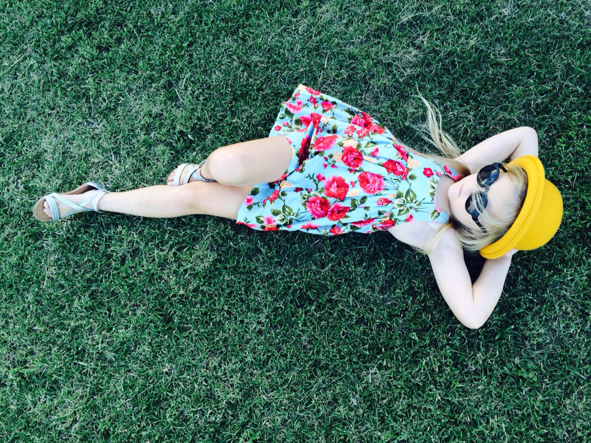 Girl laying on lawn