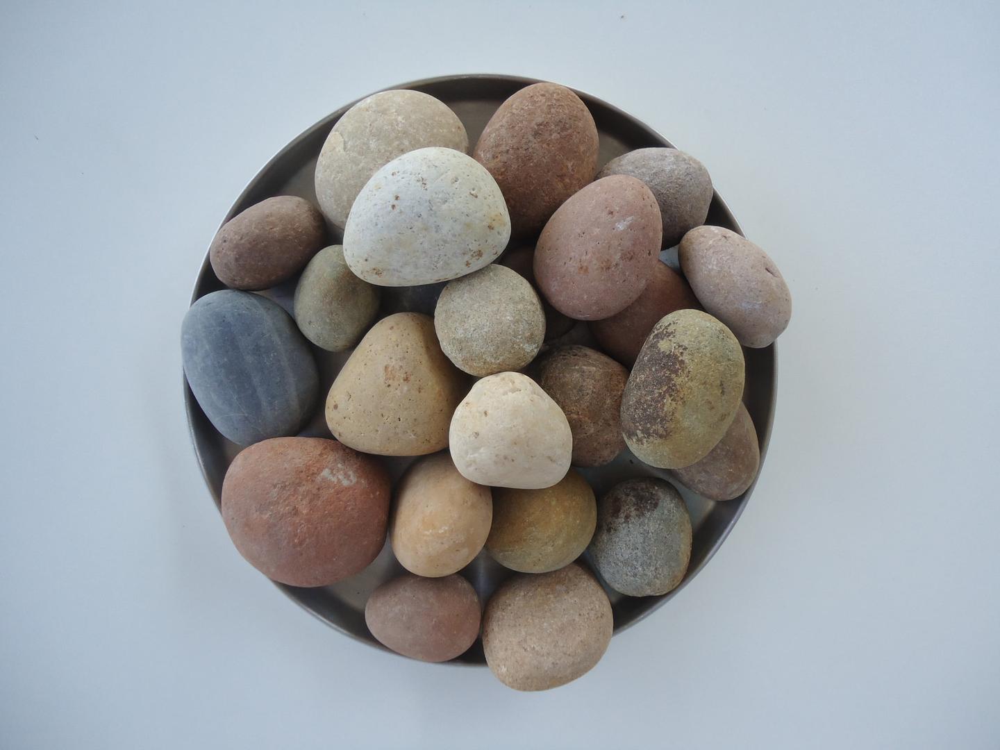 Large pebbles in a bowl