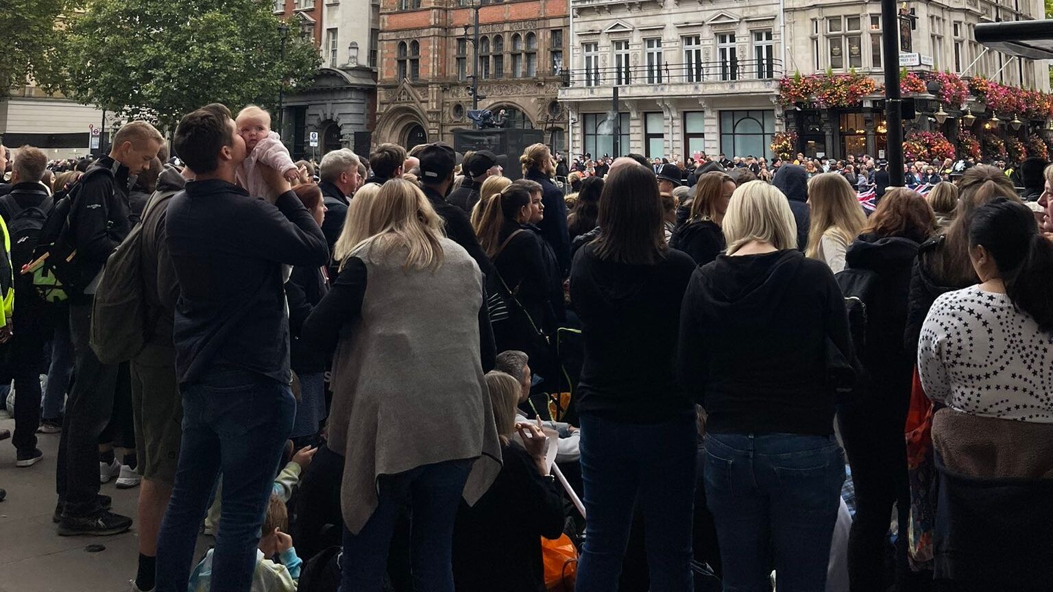 At Westminster Abbey, people gathered for the Queen's funeral 1 Outside the funeral, a community united in awe of the queen