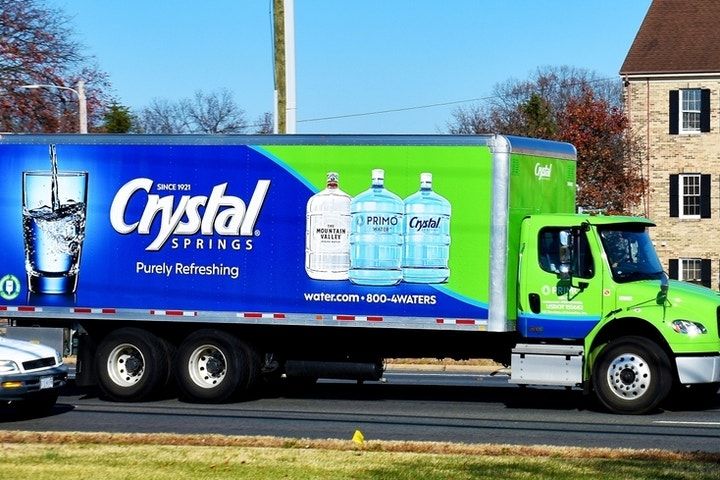Primo Brands Coverage Initiated: Analyst Sees EBITDA Gains From Cost Cuts, Bottled Water Momentum 1 Primo Brands Water Truck