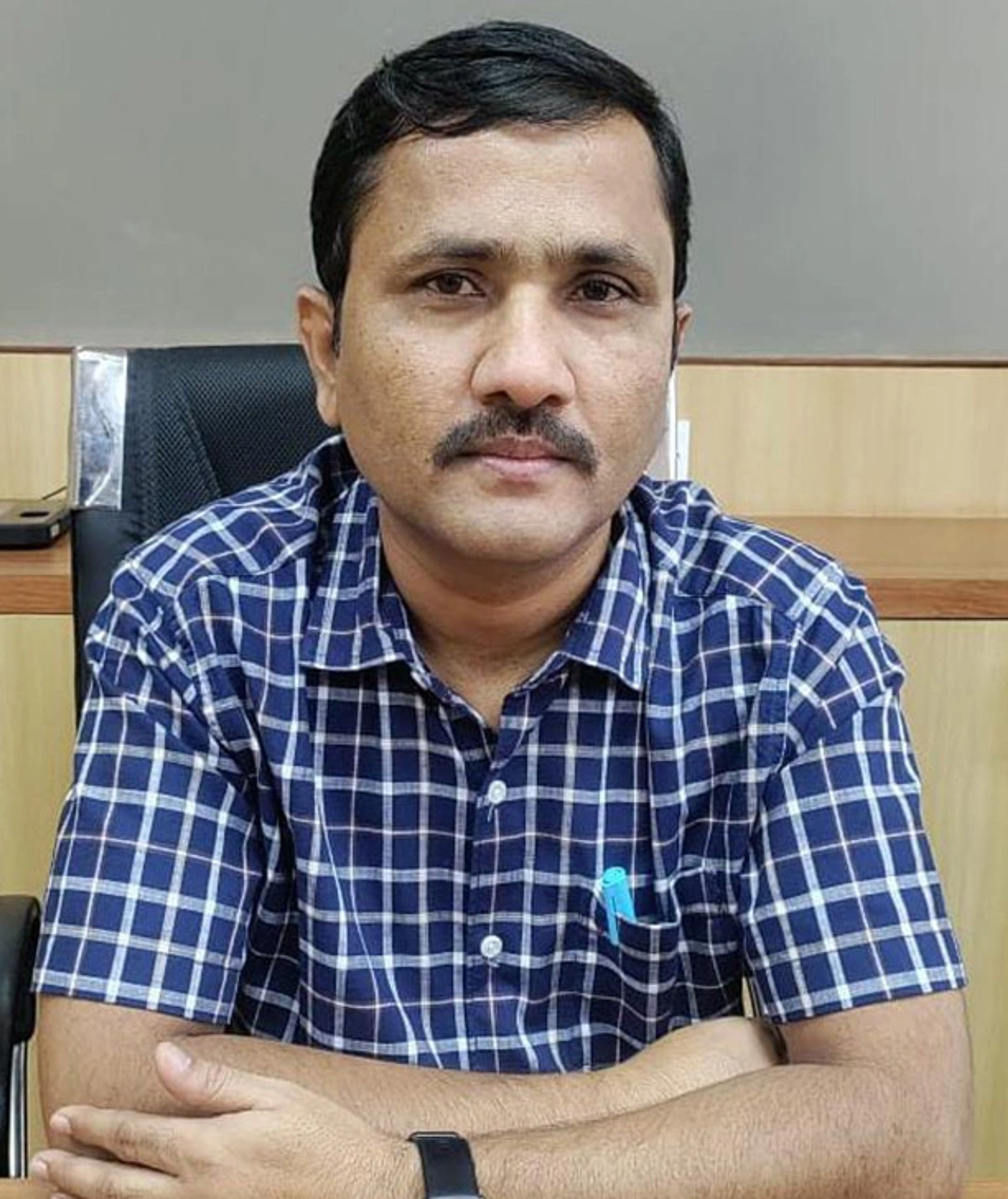 Dr. Karan Pujari