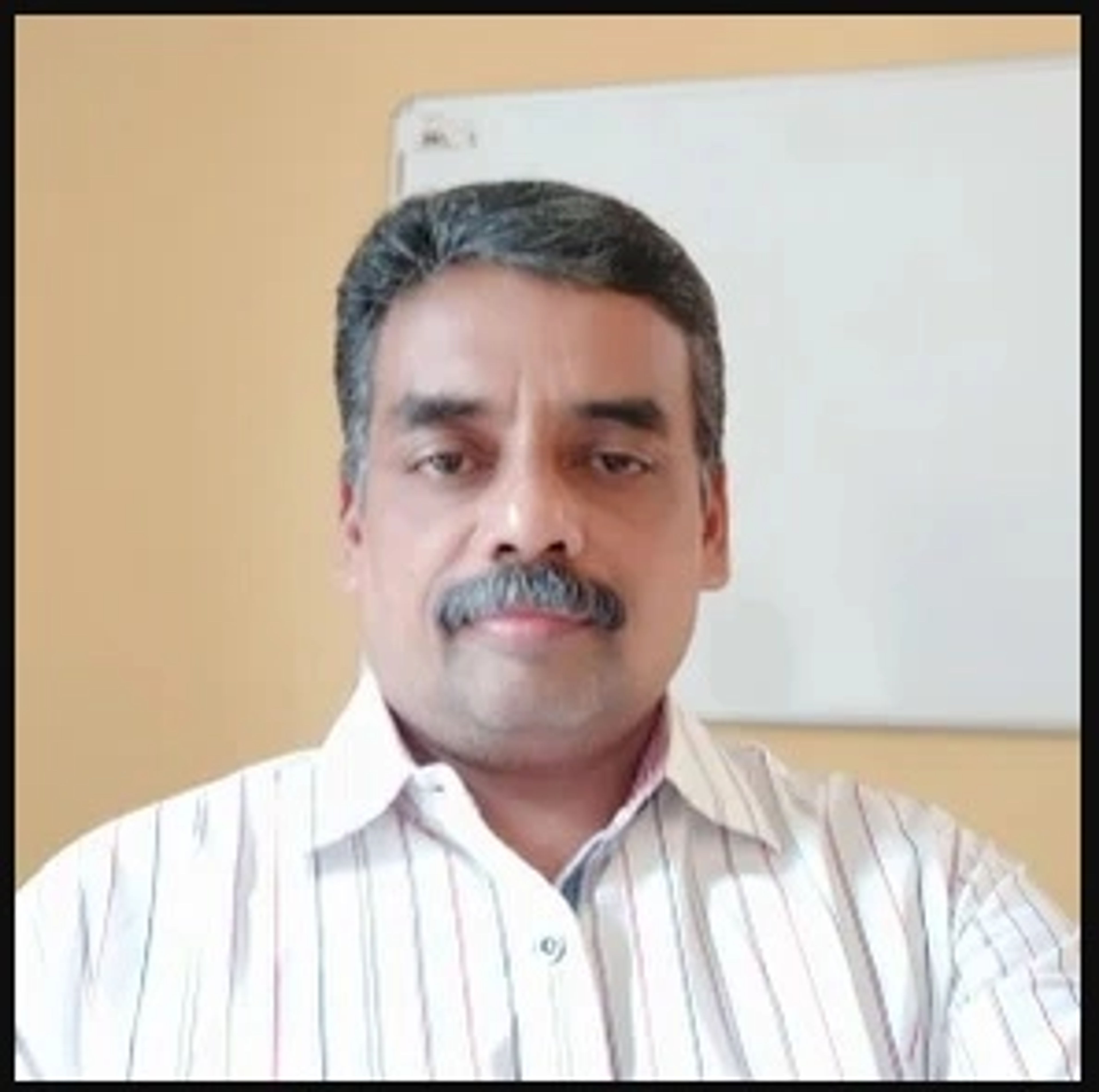 Dr. R. Manoharan