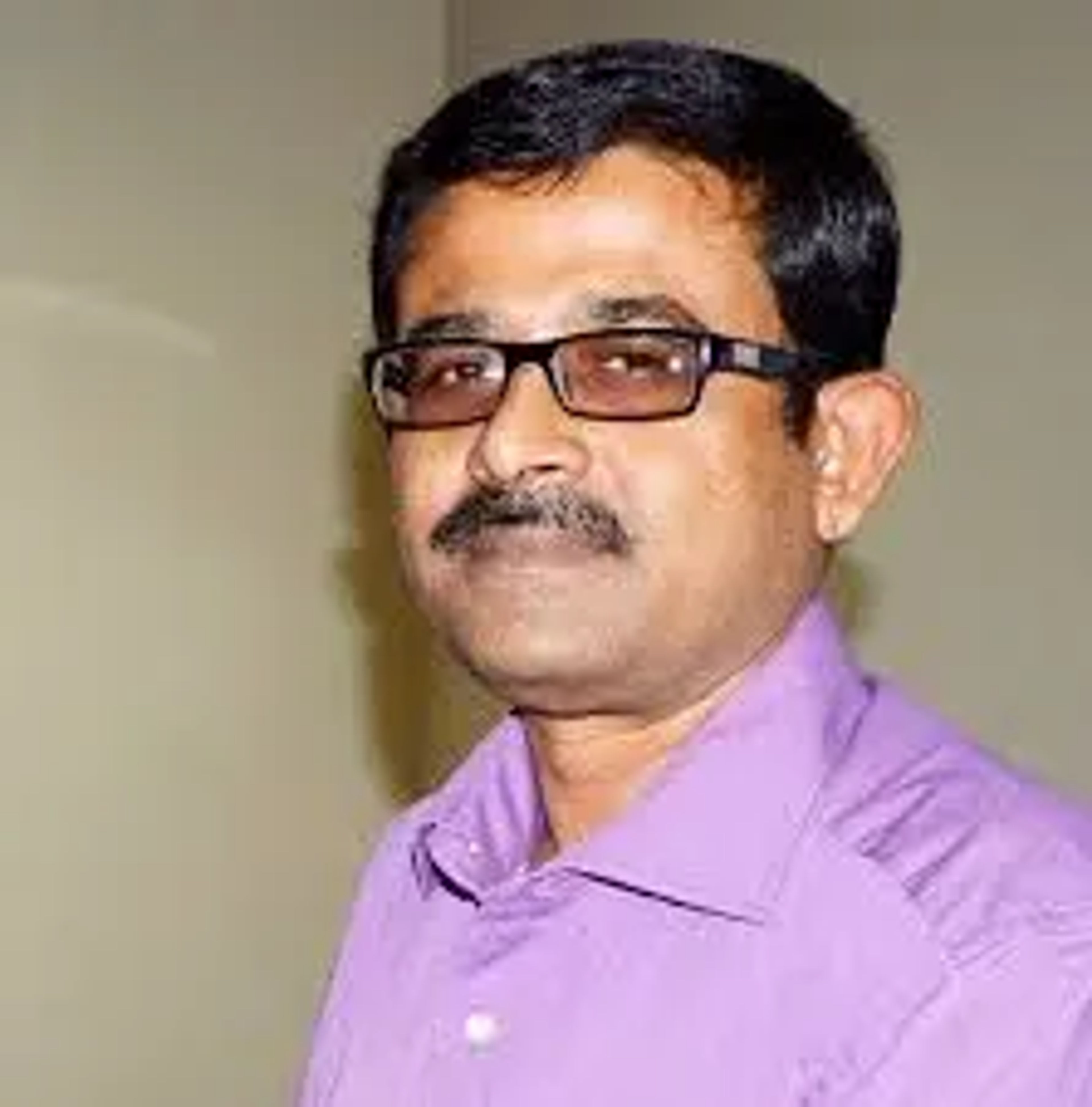 Dr. SANTANU GHOSH