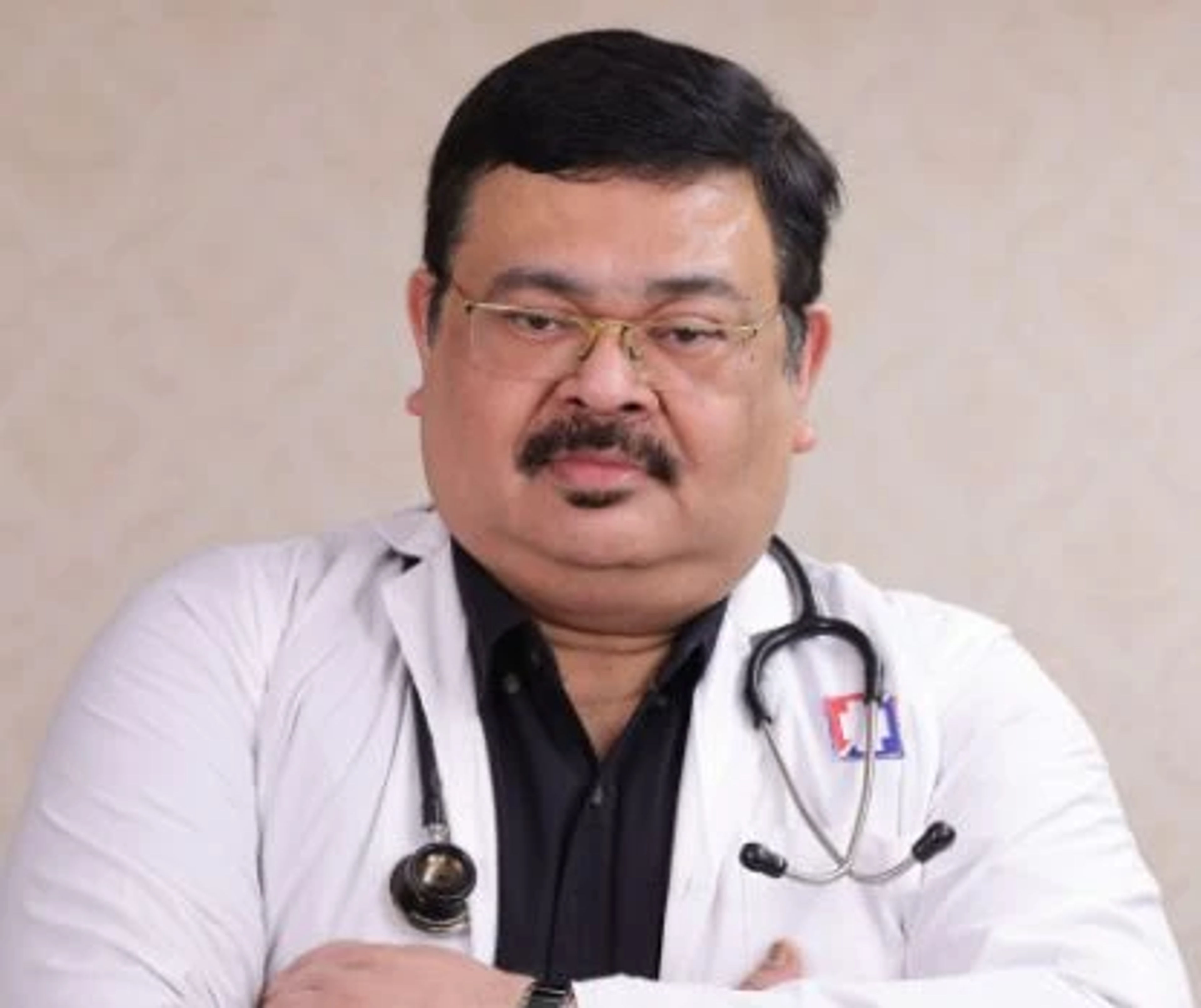 Dr. SAUBHIK SURAL