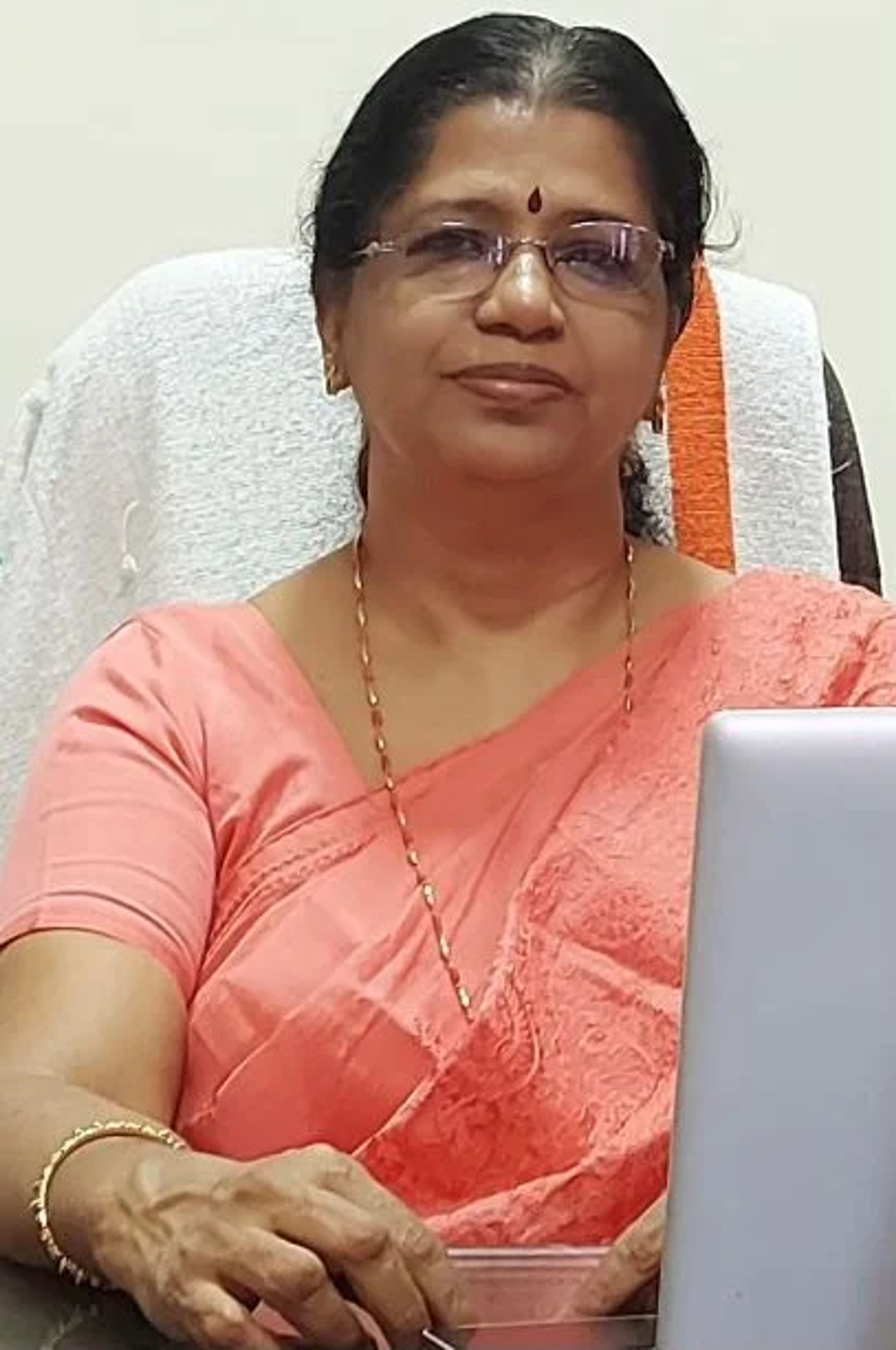 Dr. SUDHA T