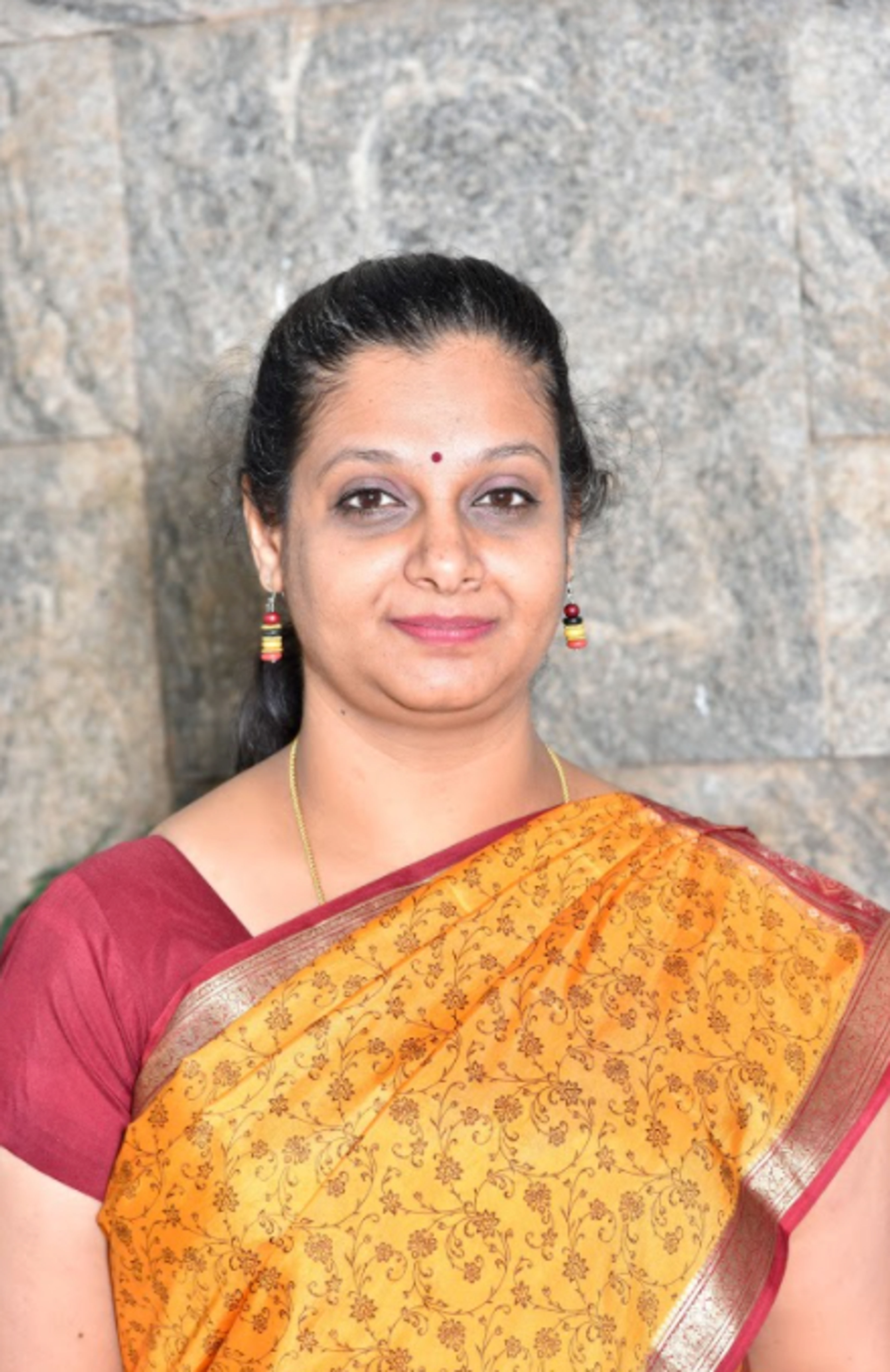 Dr. Suma S