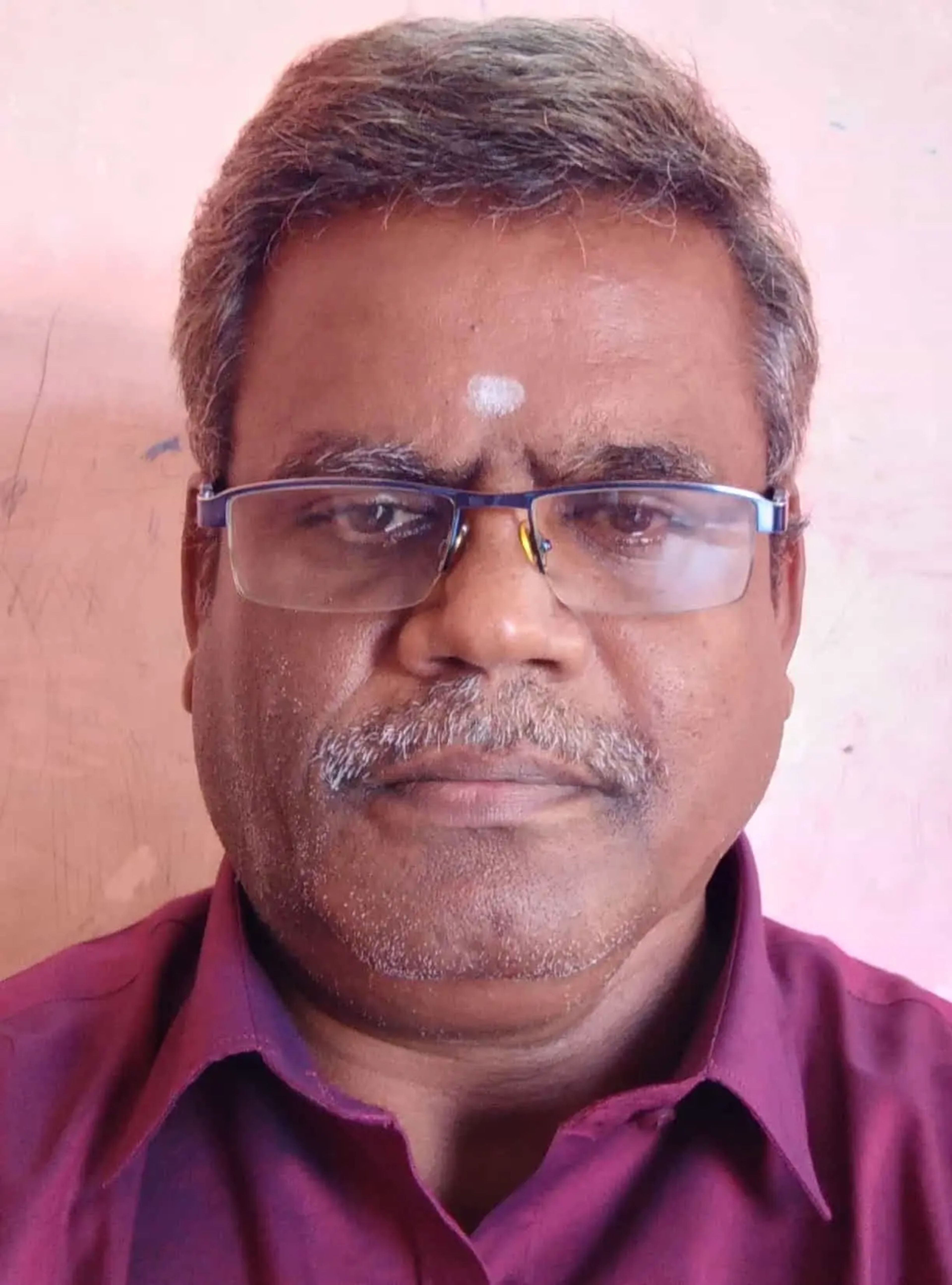 Dr Senthil T