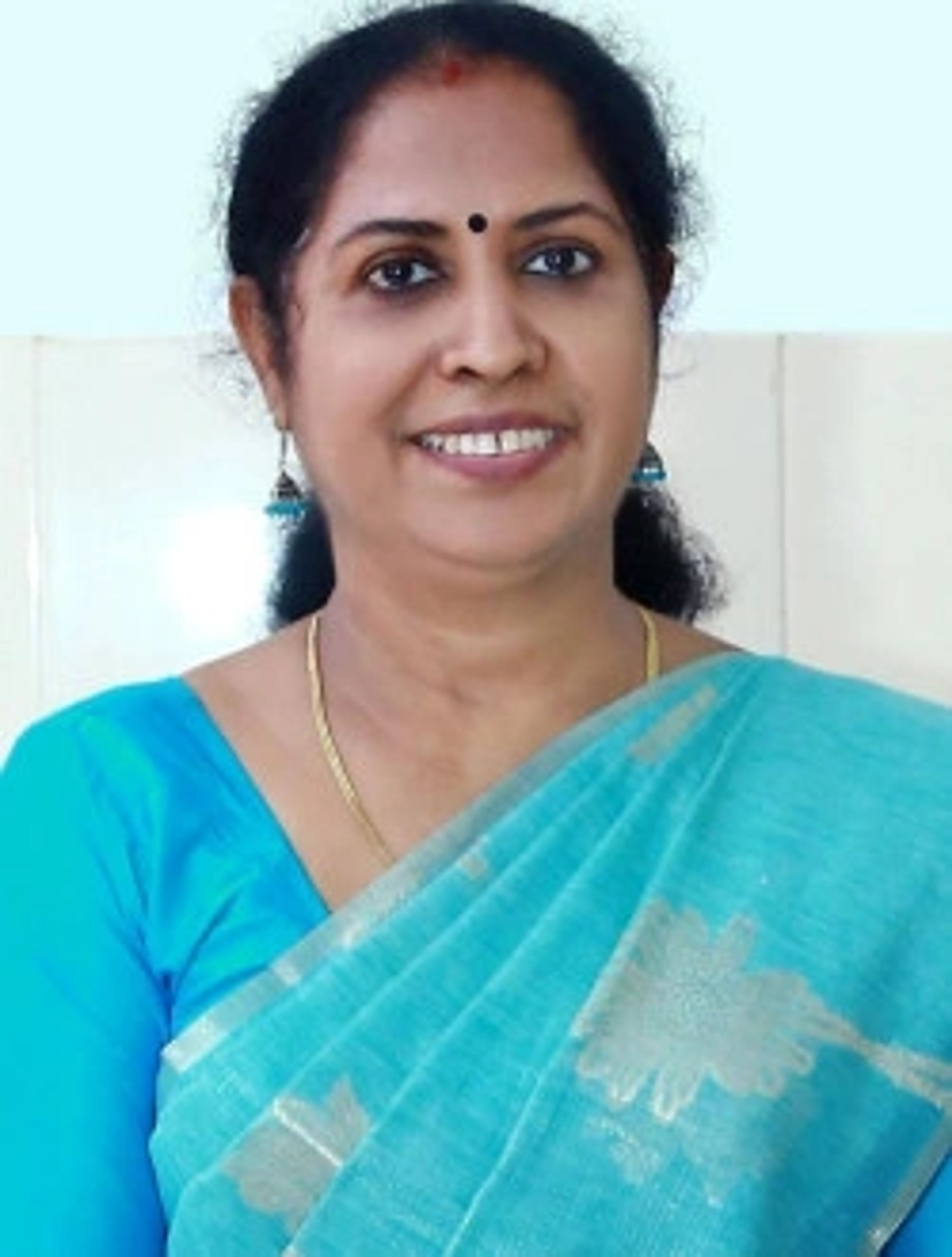 Dr. USHA K K