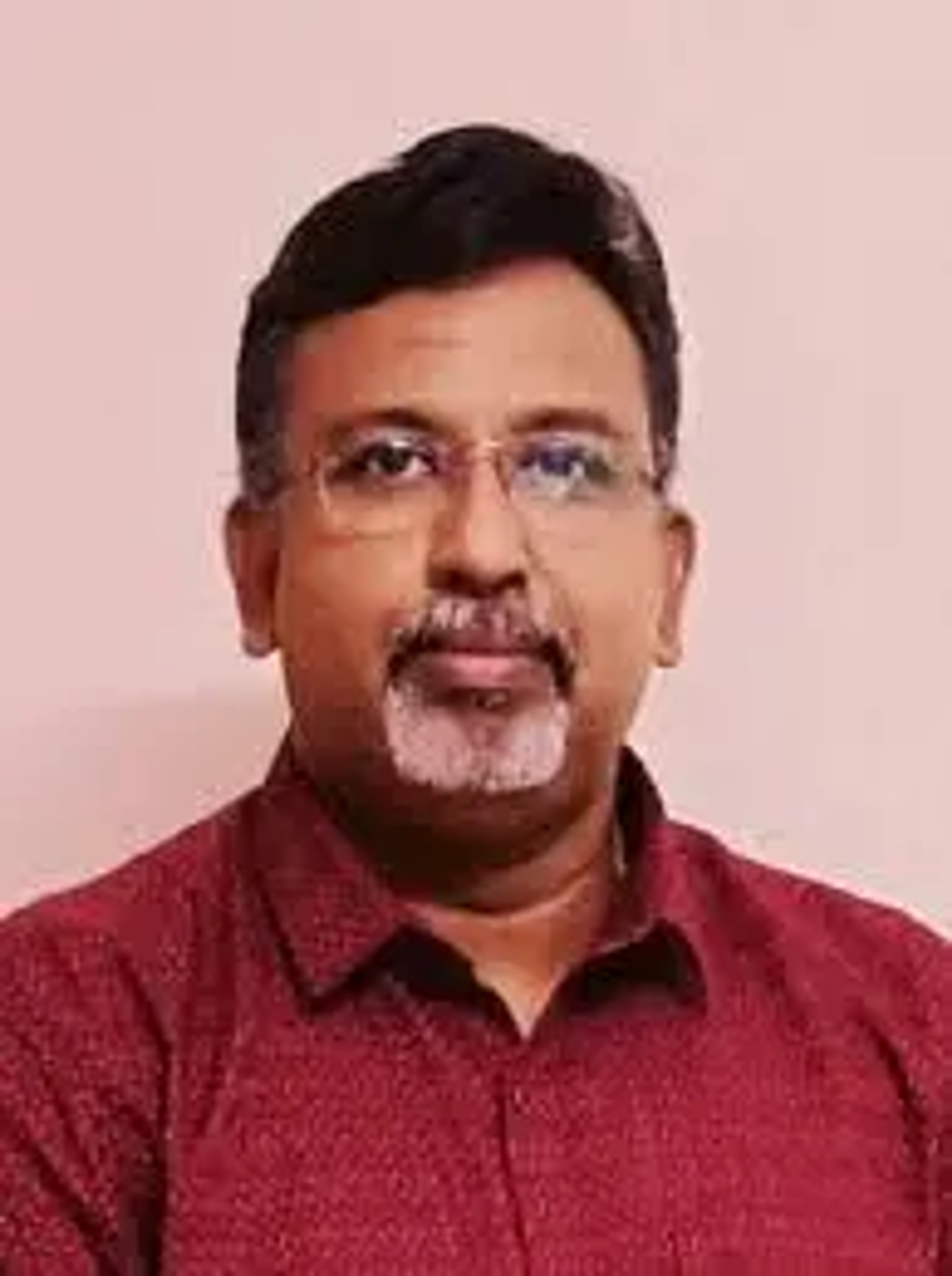 Dr. Santhosh Potharay Kuruvilla