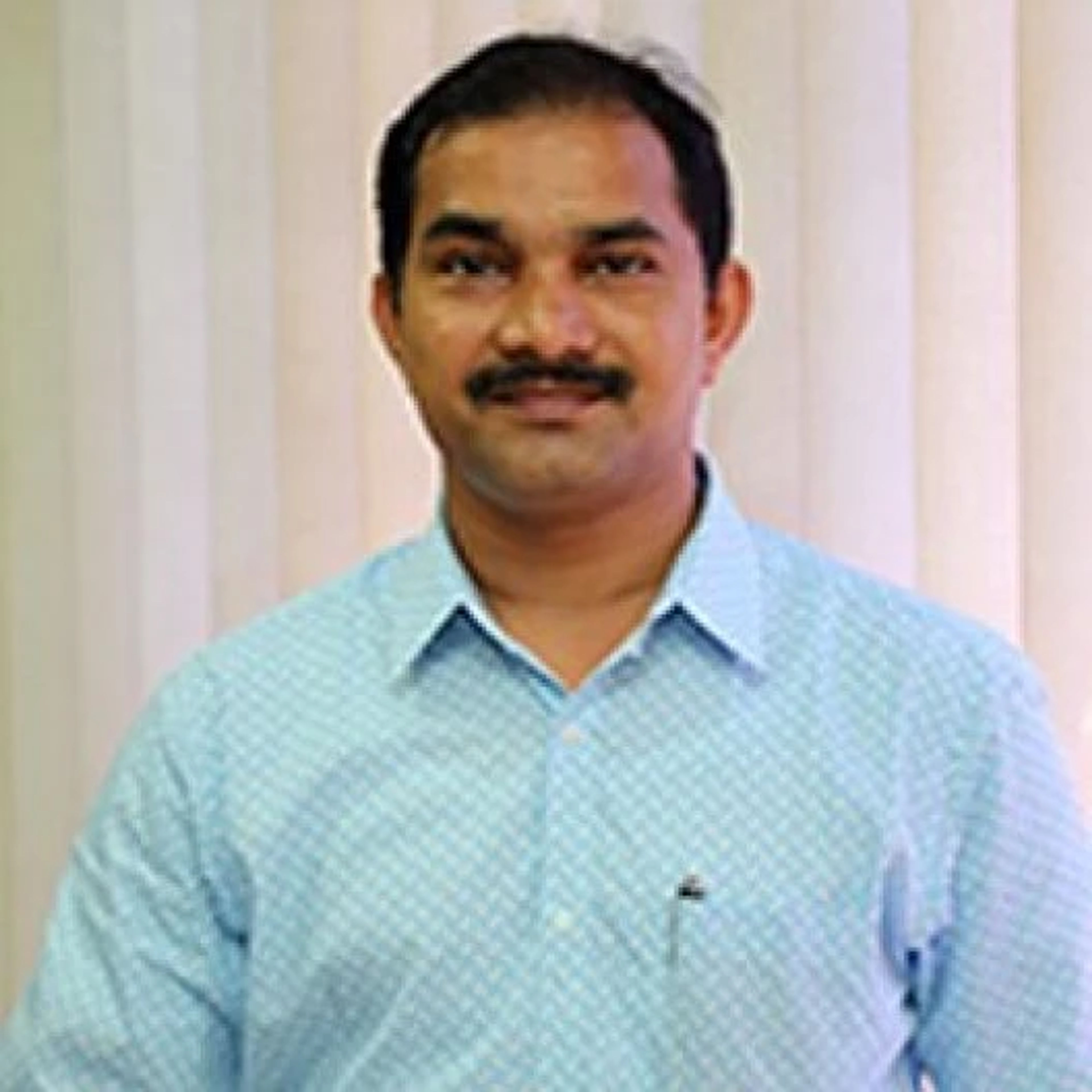 Dr Dharnappa Poojary