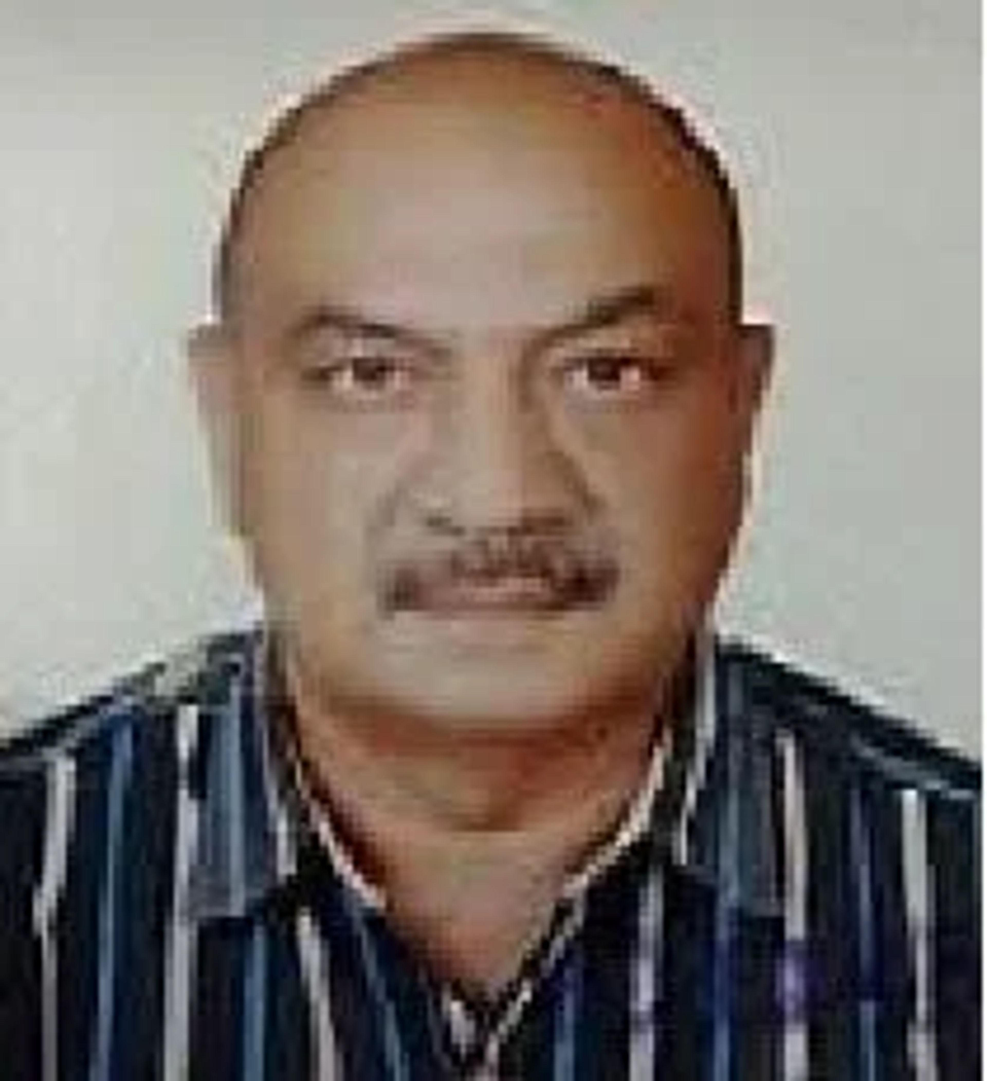 Dr. Ajit Saluja