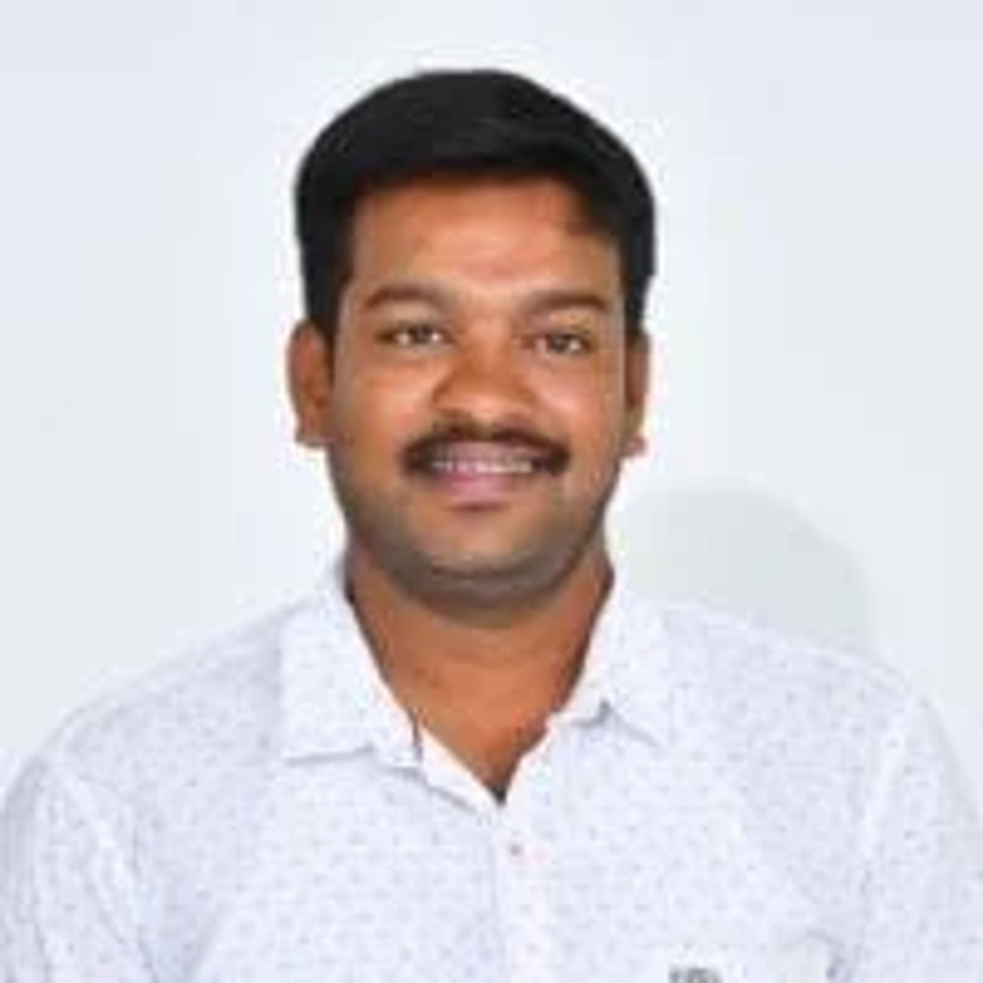 Dr. Dharmesha A G