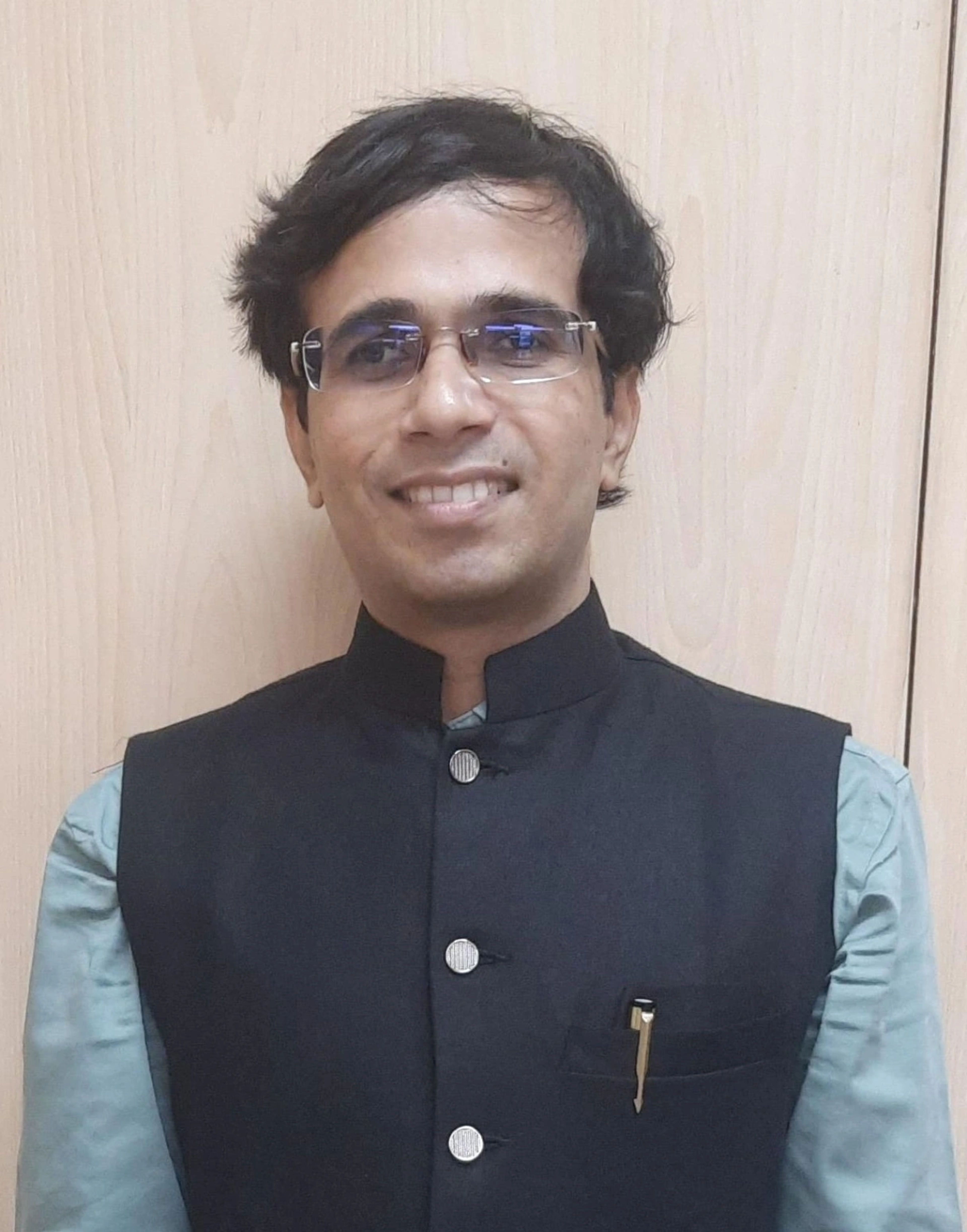 Dr. Dharma Rakshit Gautam