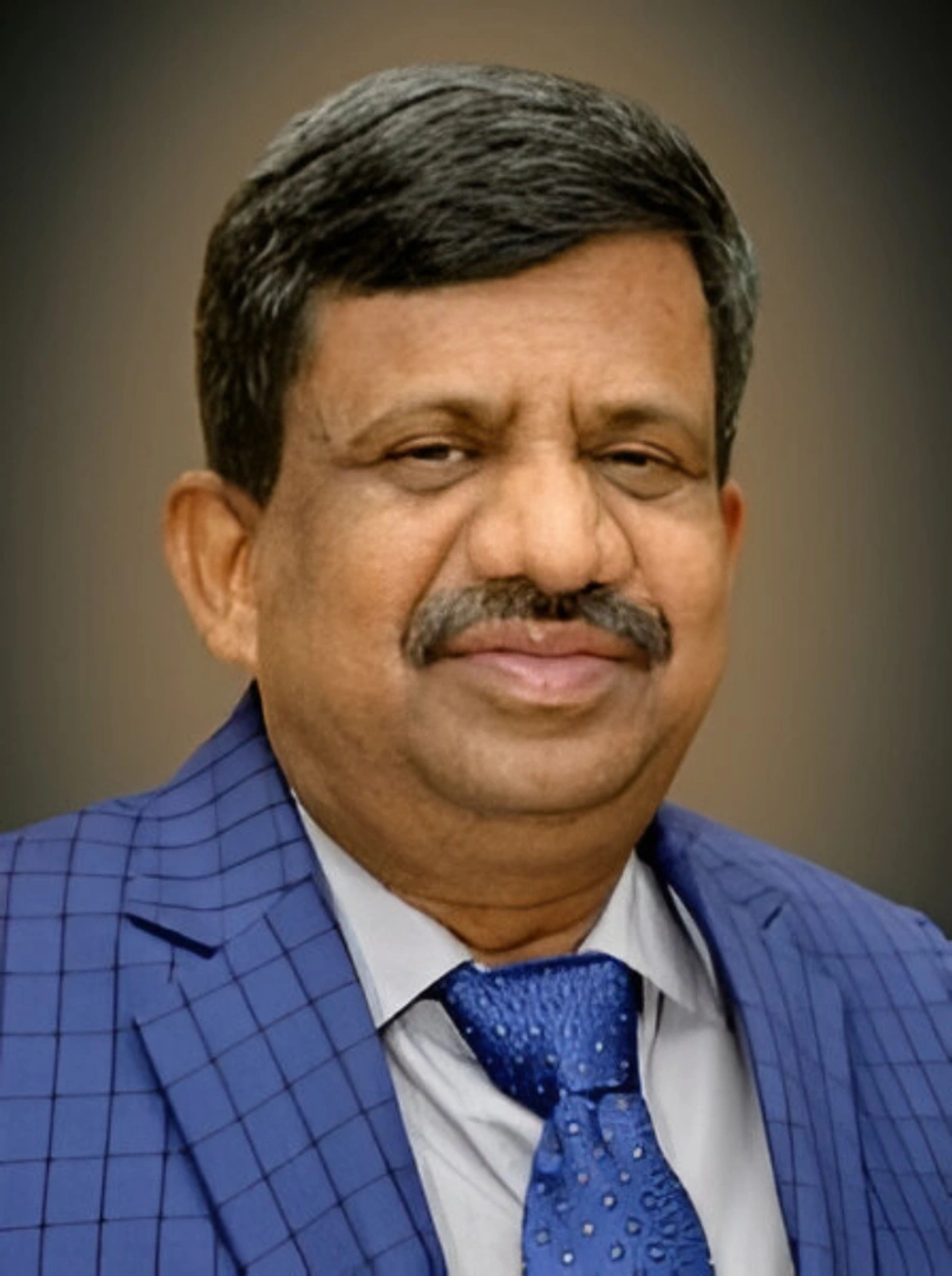 Dr. Karisiddappa