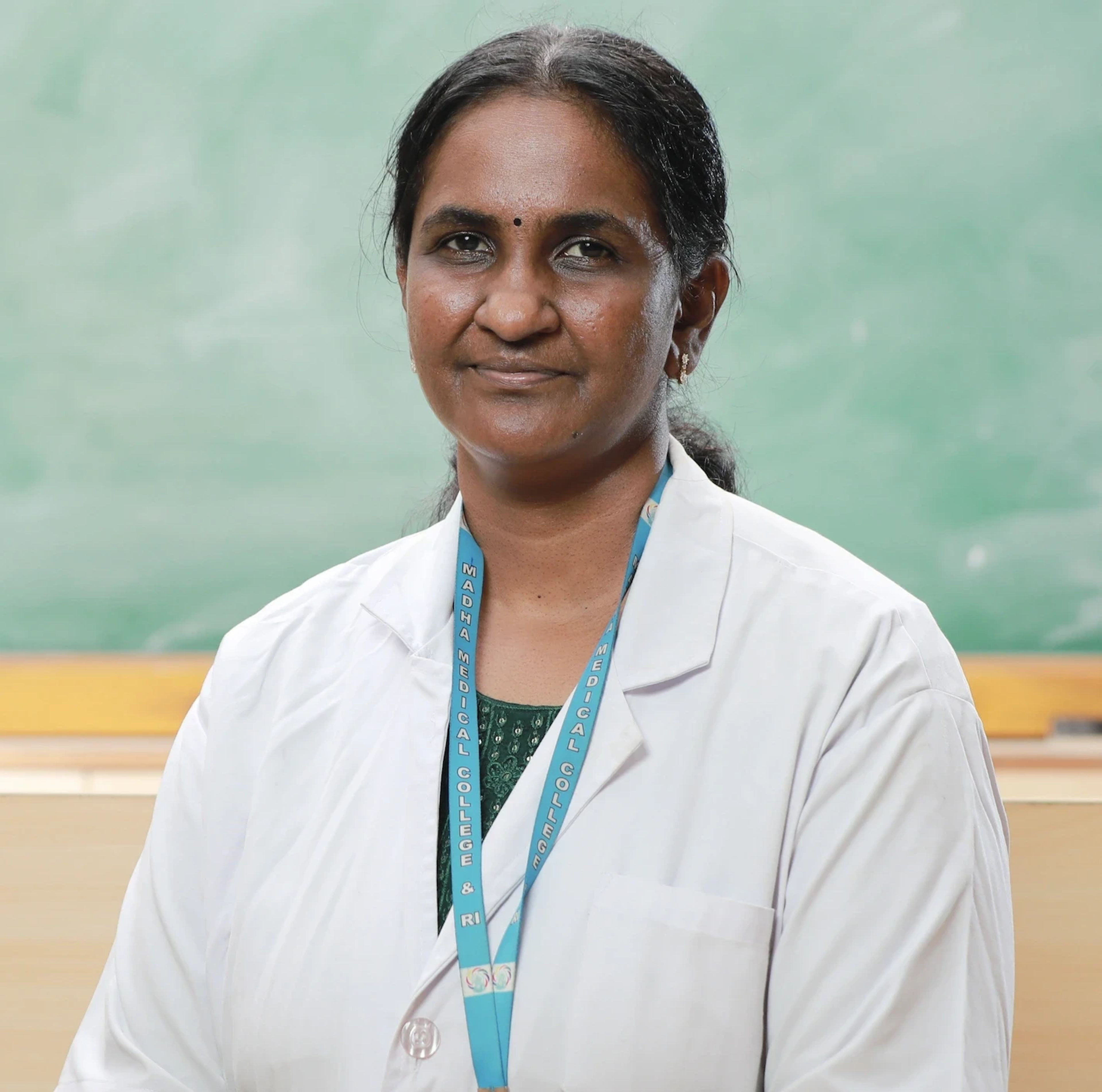 Dr. AC MALARVIZHI