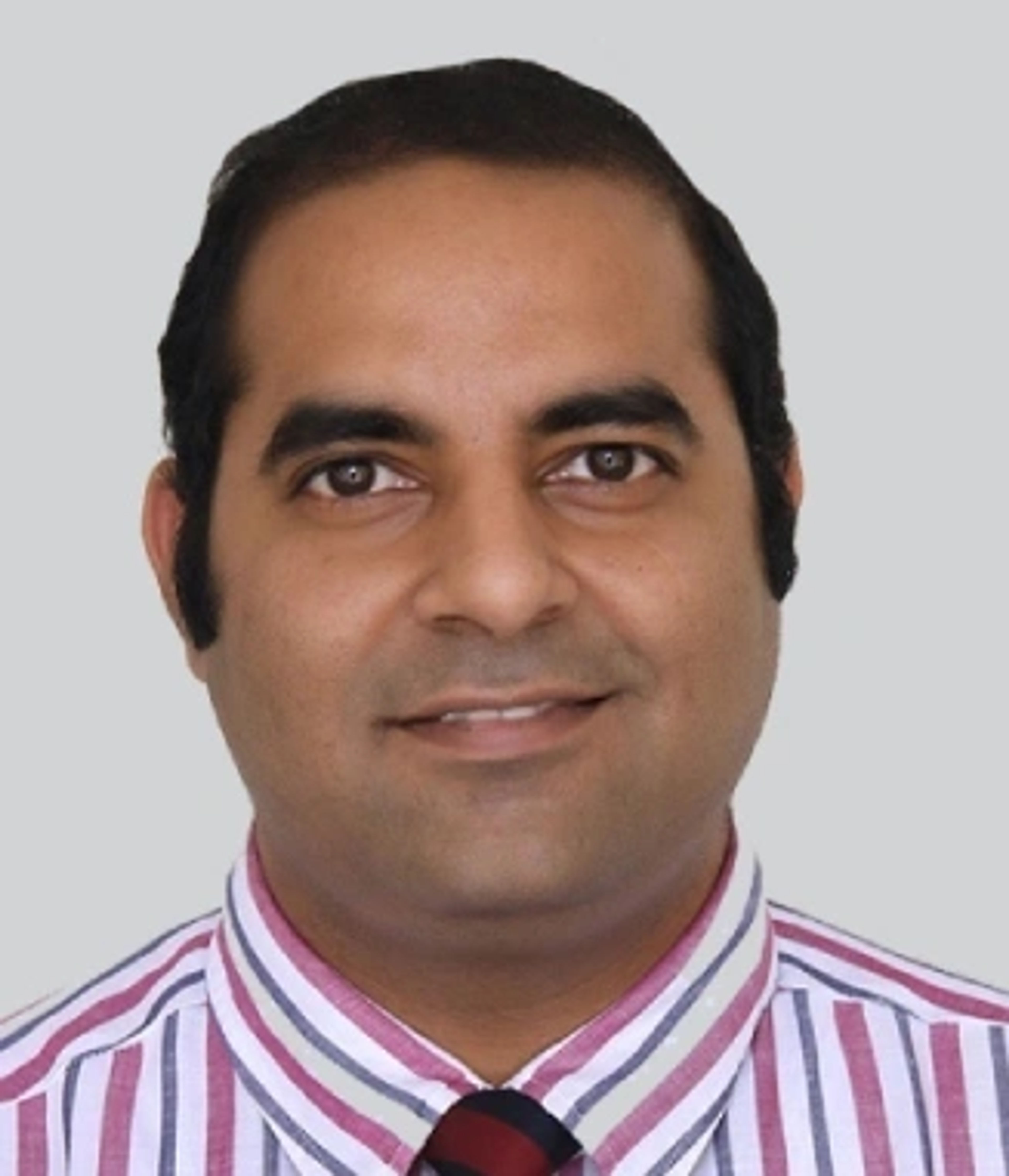 Dr. Tanuj Mathur