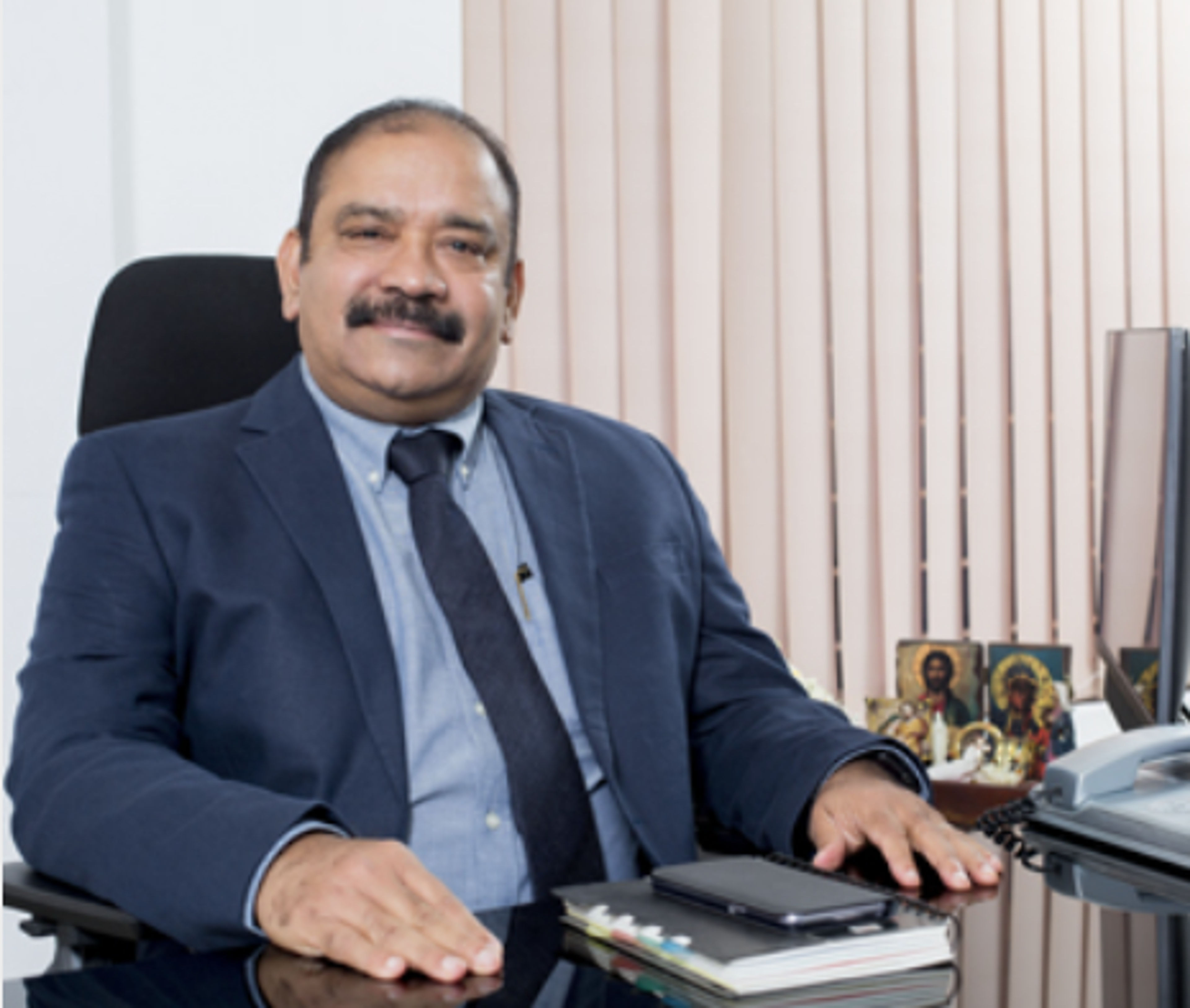 Dr. P.V. Louis