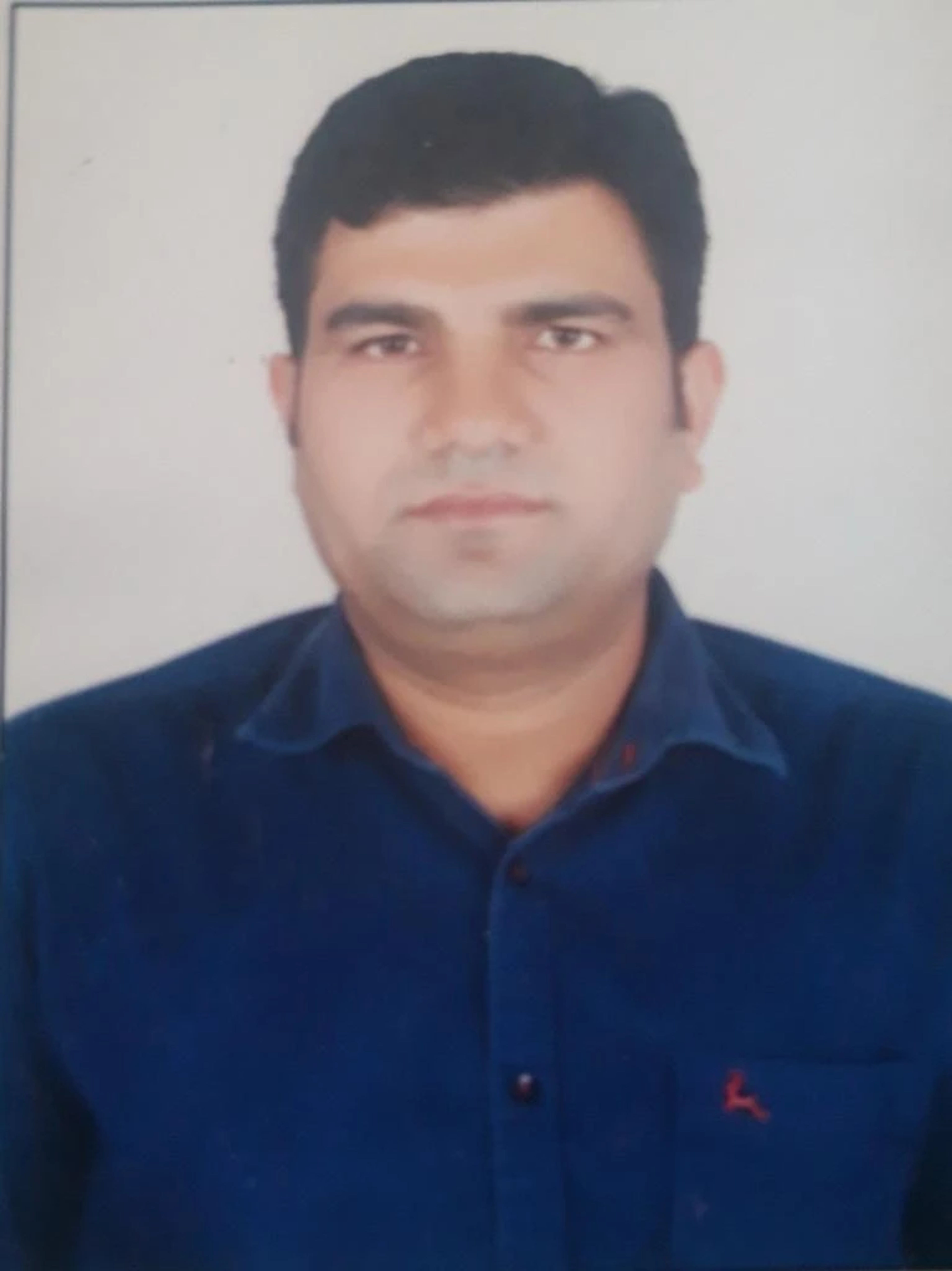 Dr. Dharmendra Singh