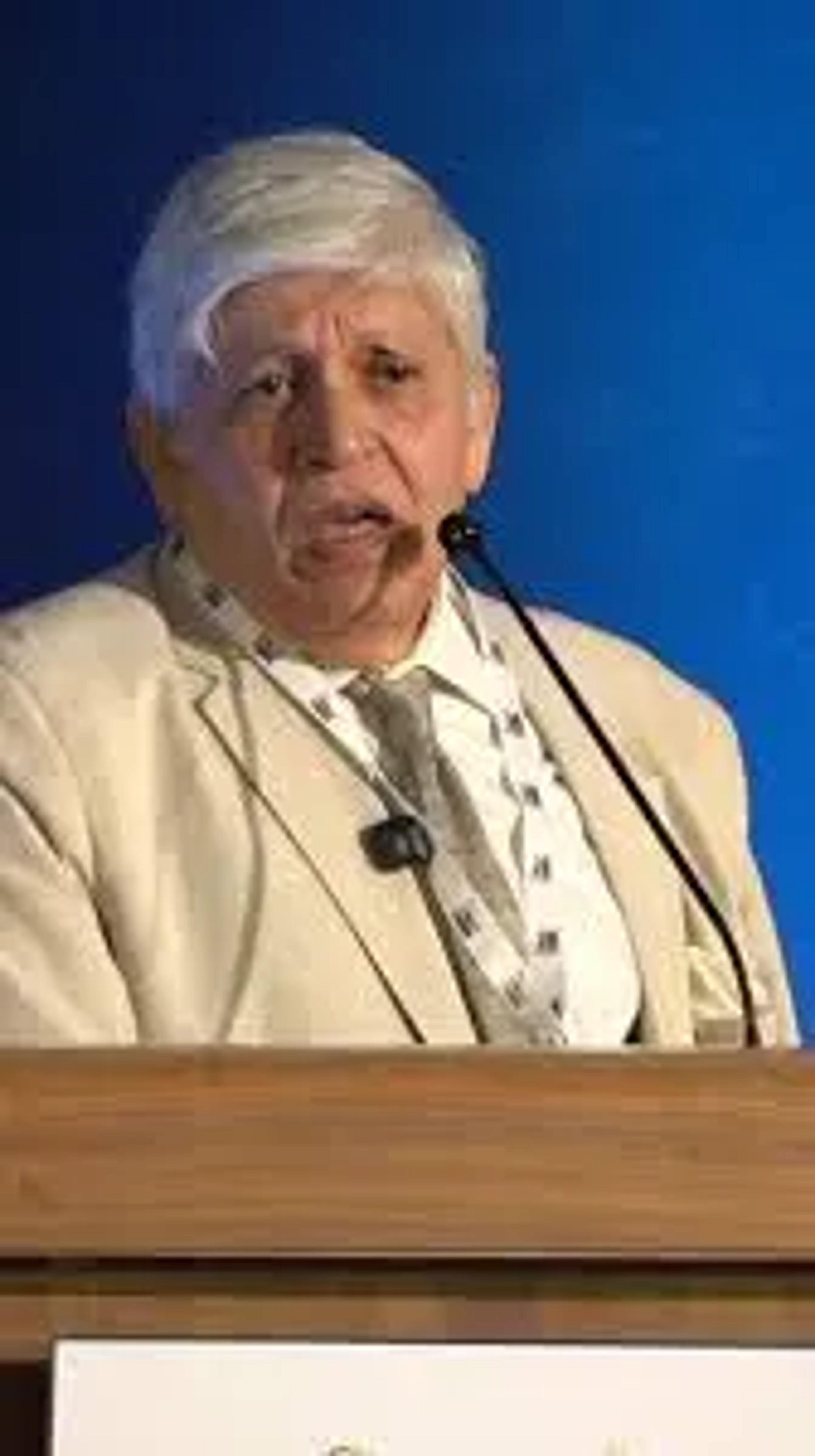 Dr. Atharuddin Hakimuddin Kazi —