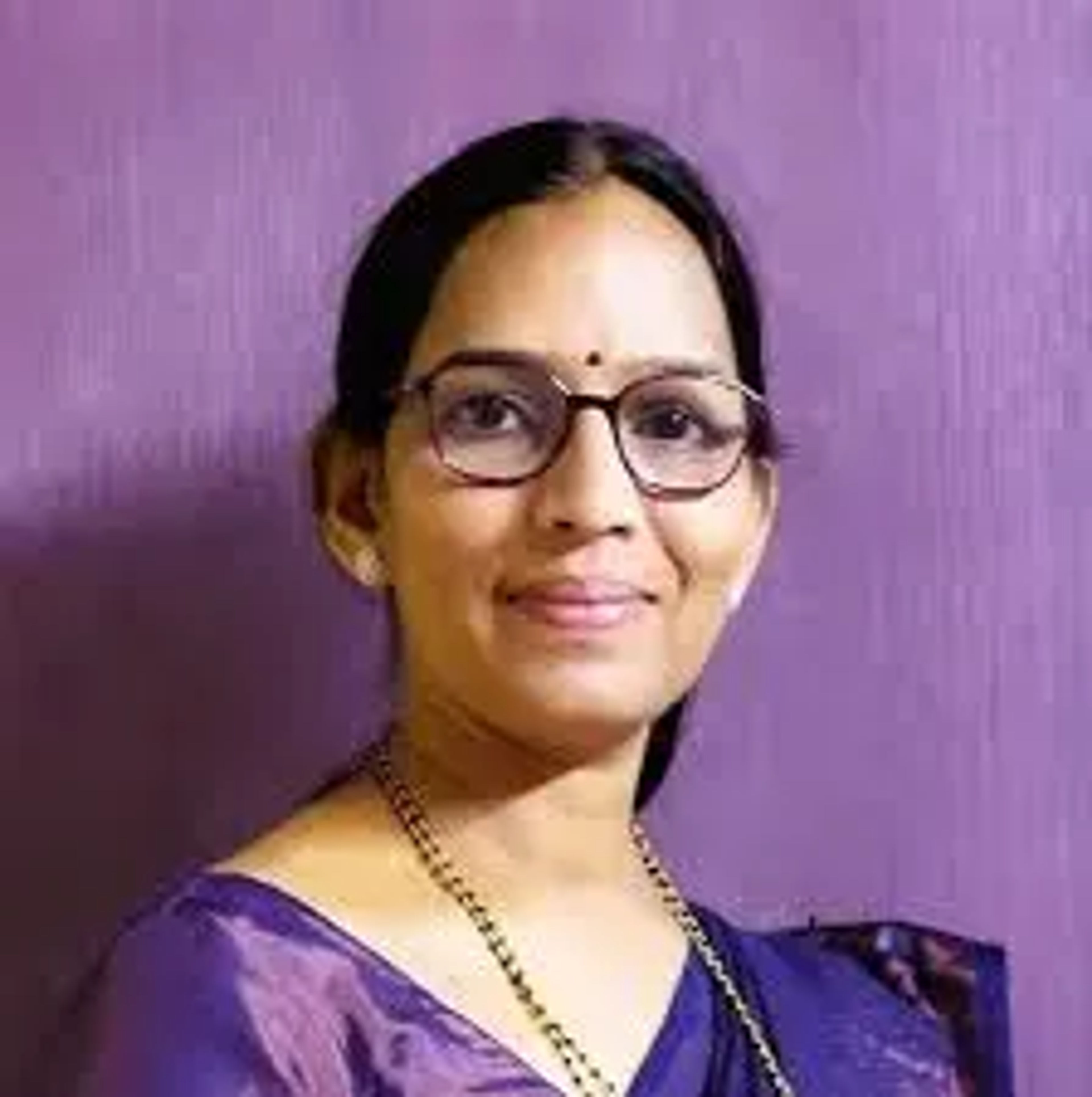 Dr. Asha B. Patil