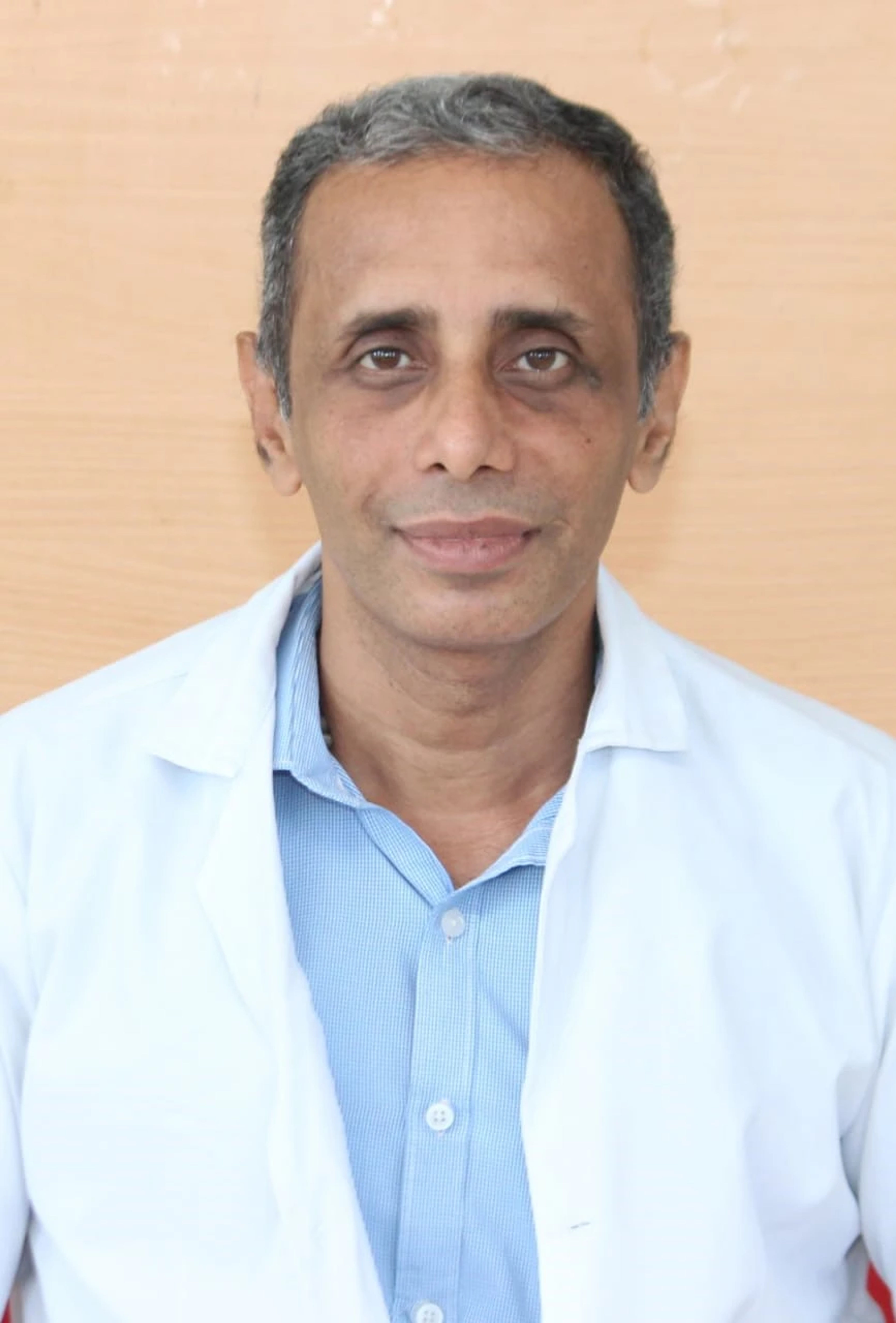 Dr. Vivek George,