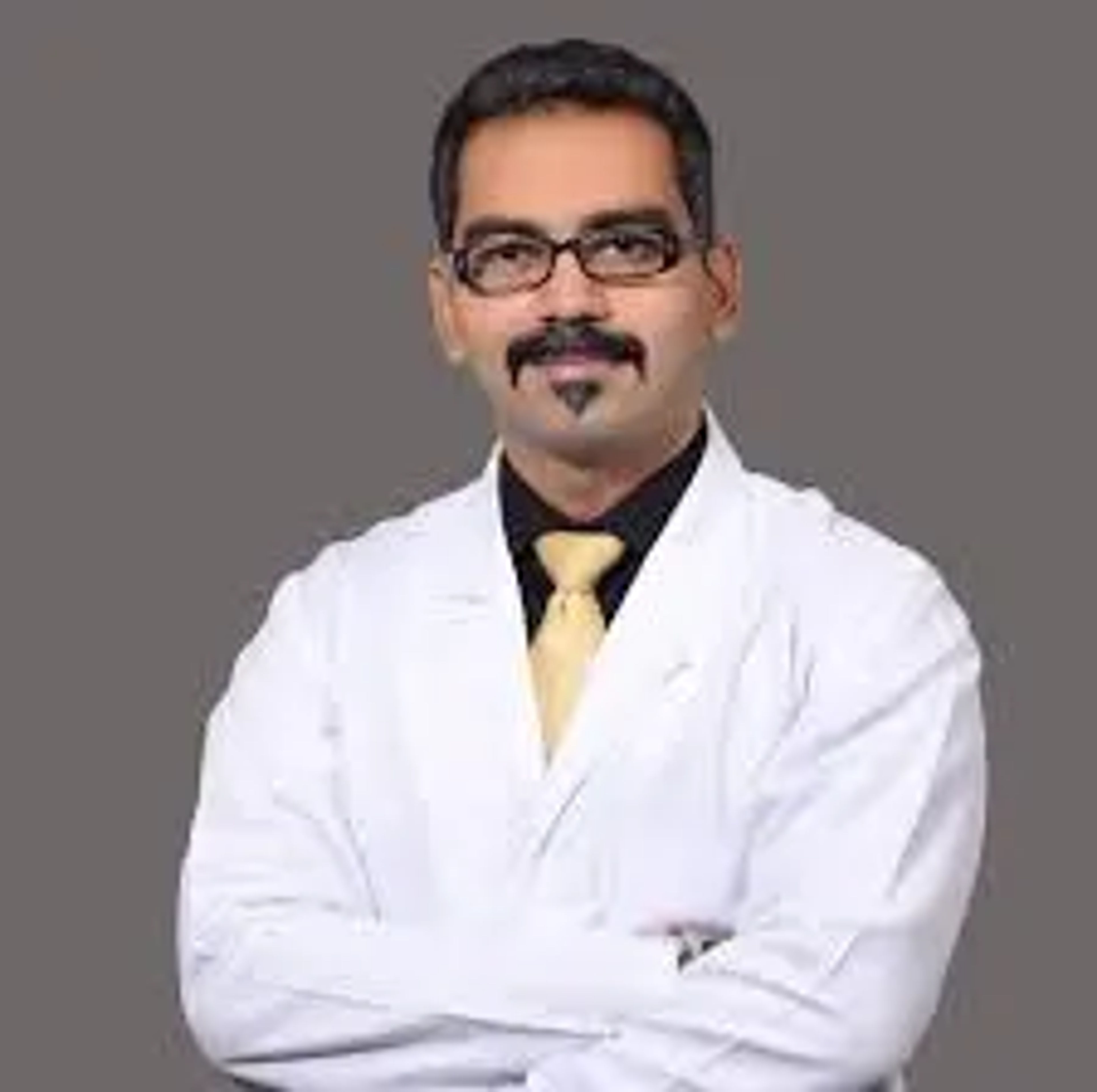 Dr. Atul M