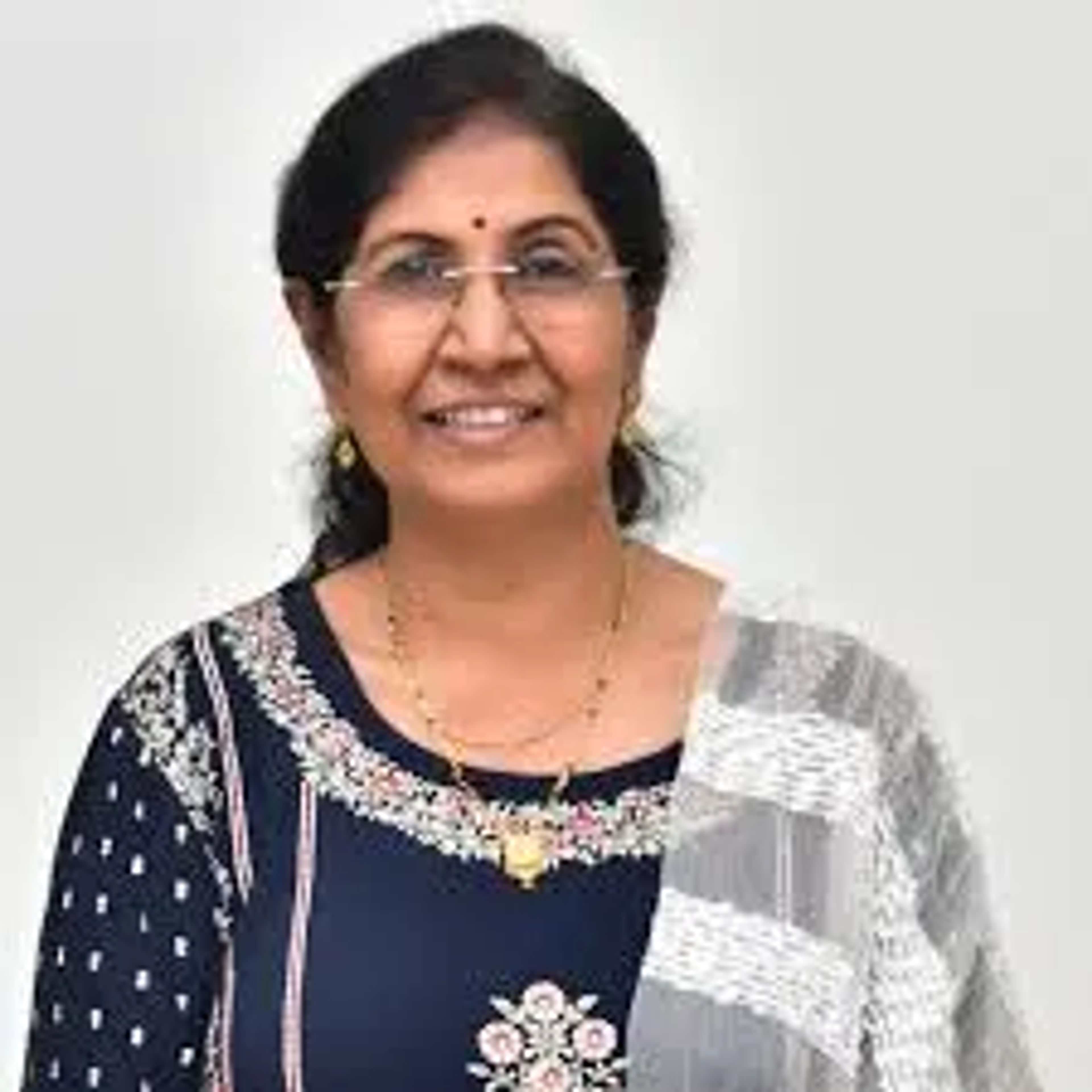 Dr. (Mrs.) R. A. Keswani