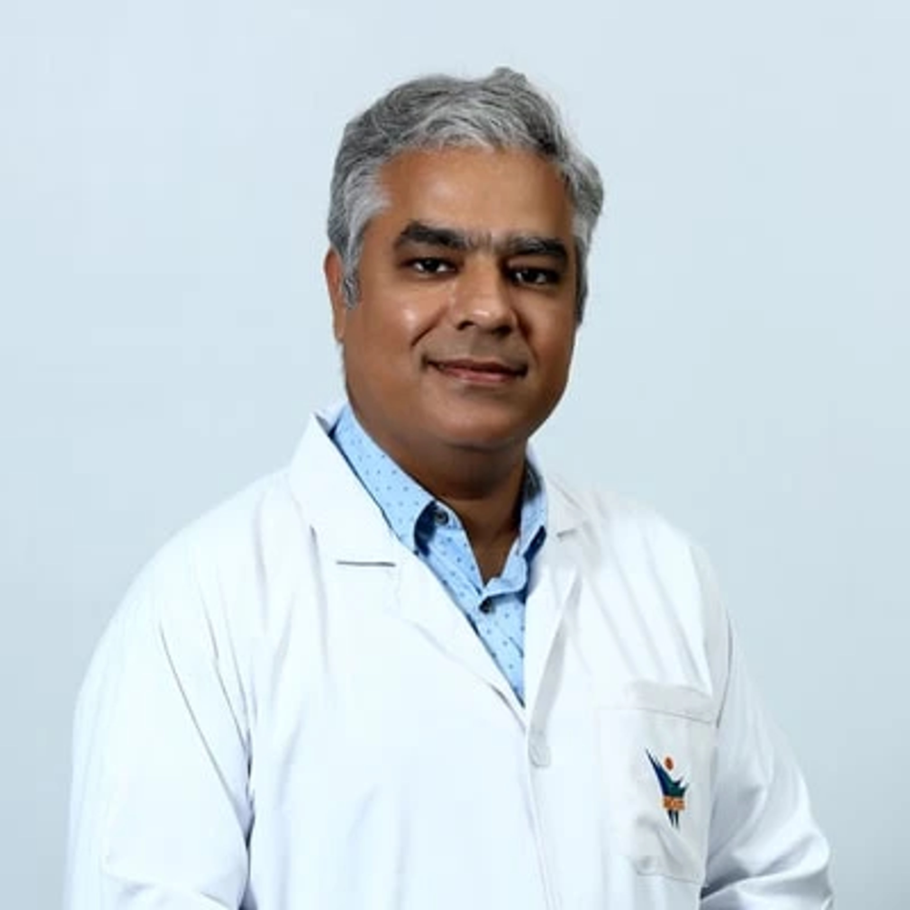 Dr. Rajan Sharma