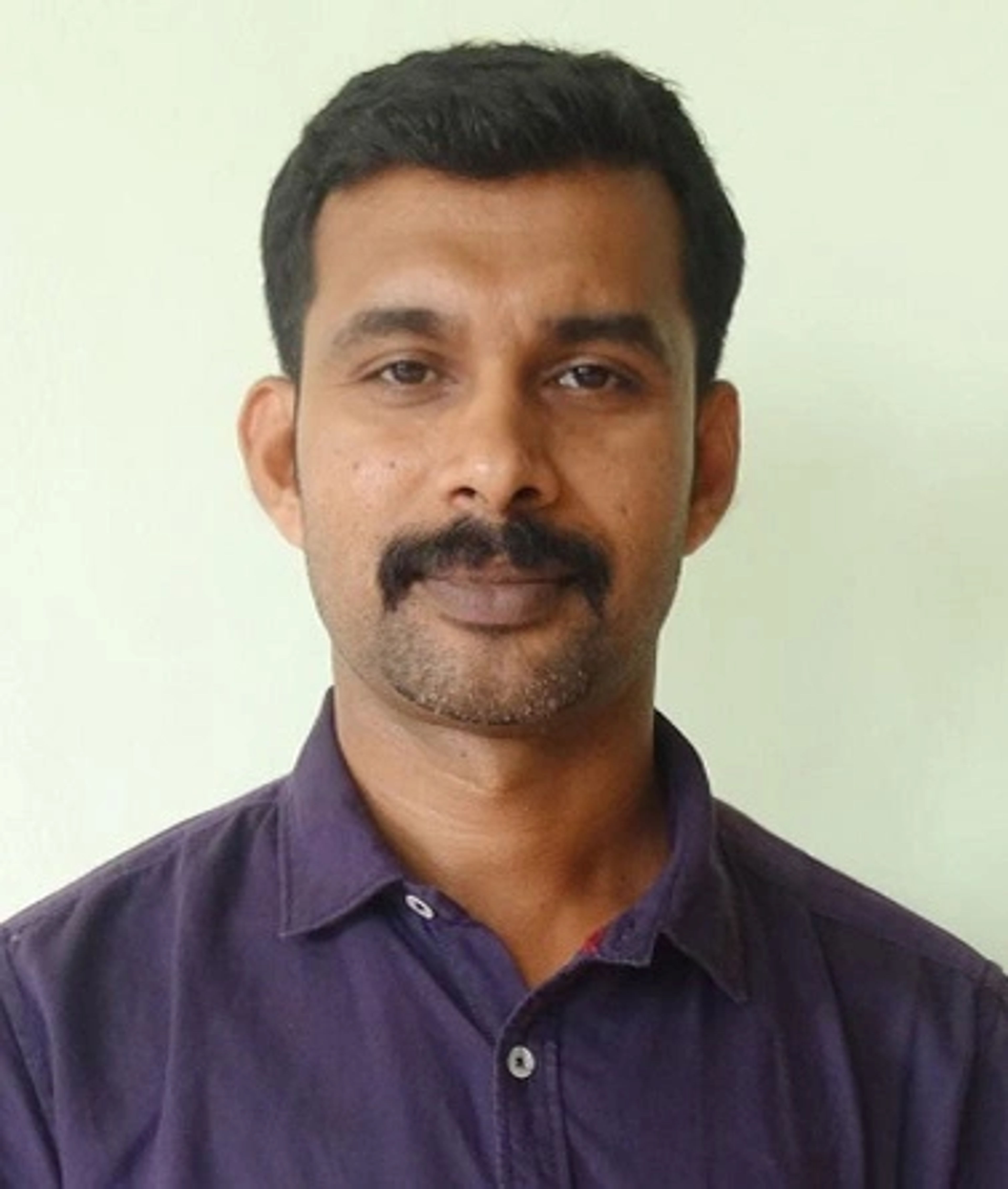 Dr.Titto Varughese