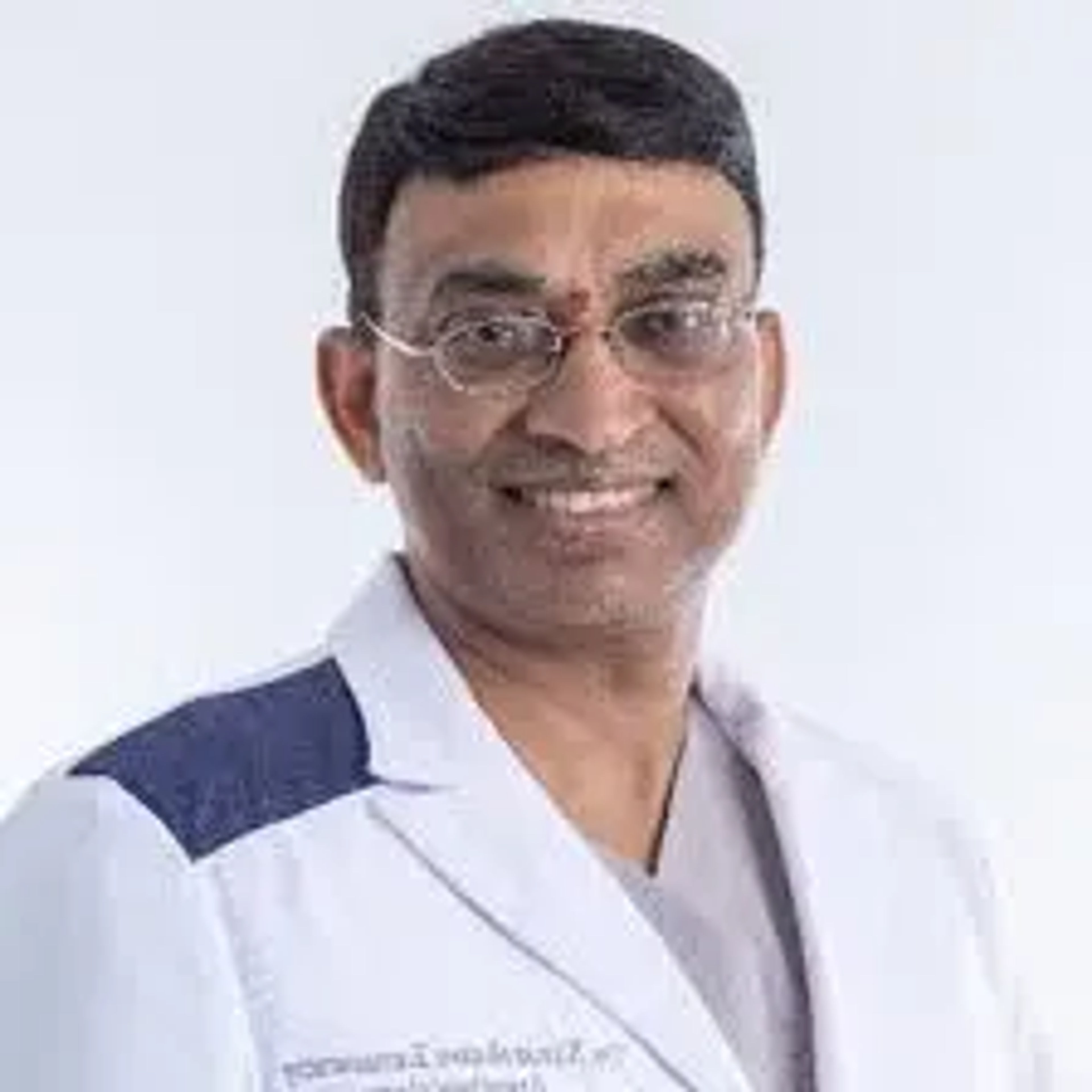 Dr. Karunakar Adappa