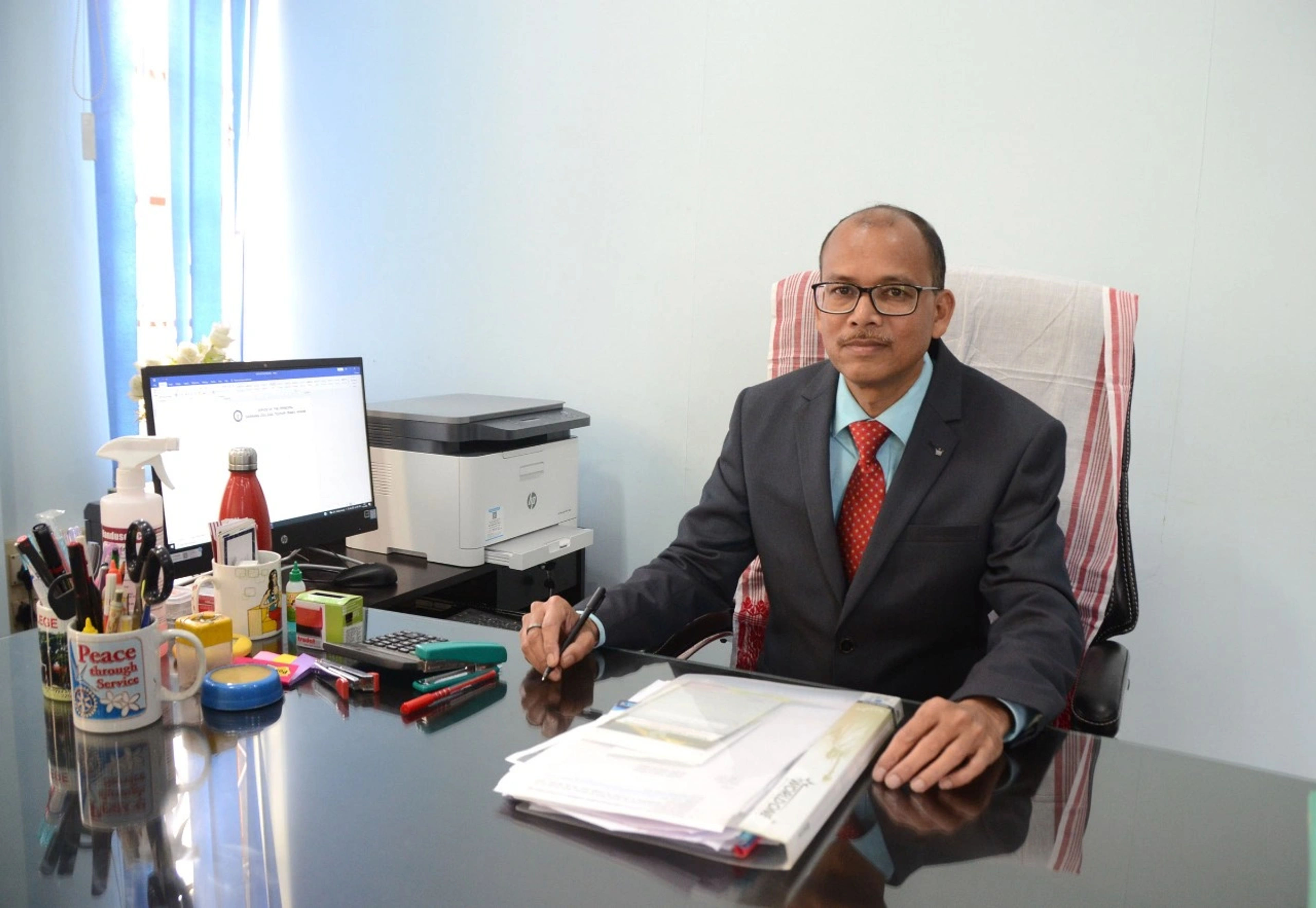 Dr. Palash Moni Saikia