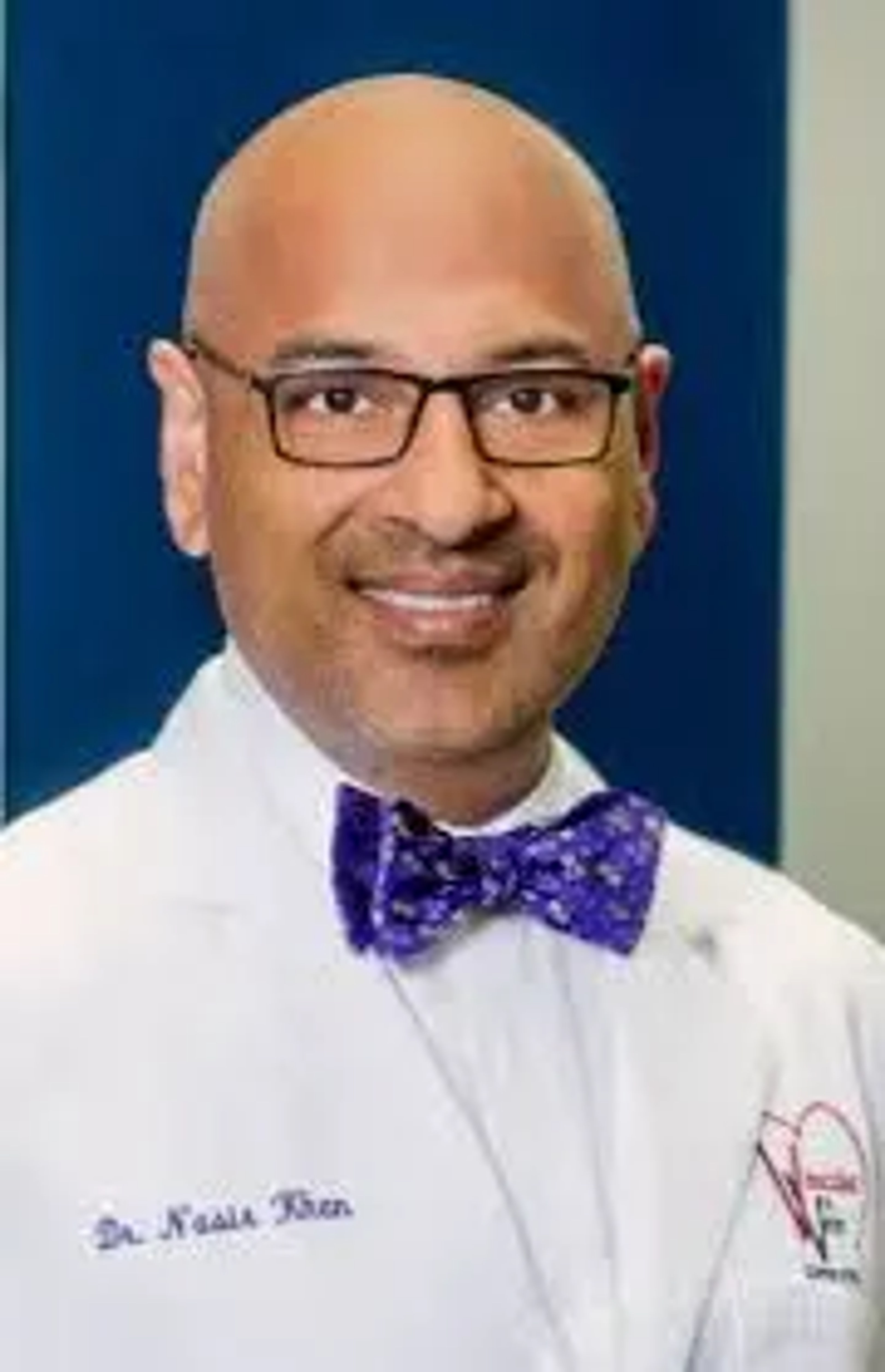 Dr. Nasir Mohamad Khan —