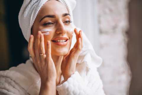 woman-applying-face-cream.webp