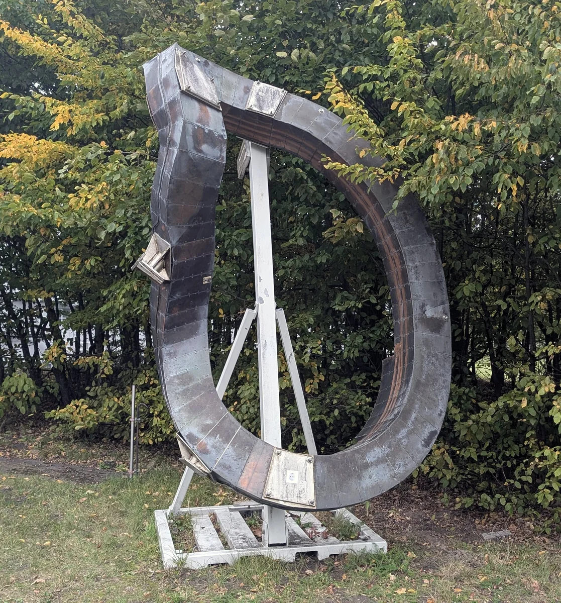 A non-planar coil from the Wendelstein 7-X stellarator.jpg; contextual photograph, not a depiction of the named company's product.