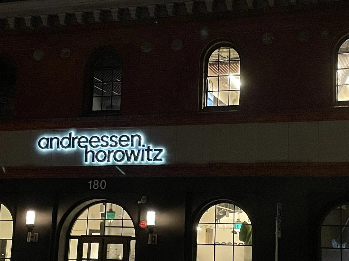 Andreessen Horowitz's San Francisco office building at night.
