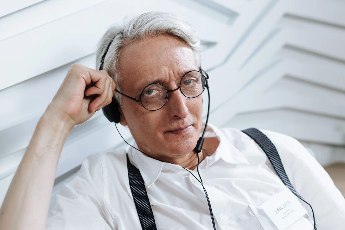 A customer support worker wearing a headset.