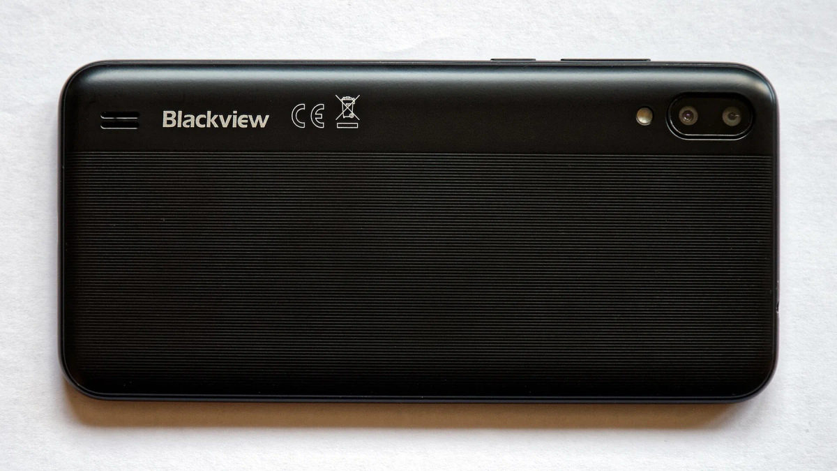 A black smartphone is shown from the back.