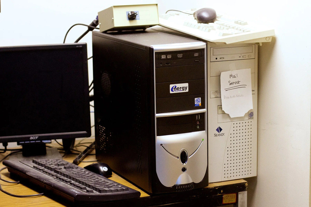 Rows of rack-mounted servers and network equipment in a computer room.