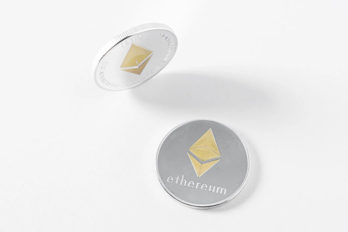 A physical Ethereum token photographed close up.