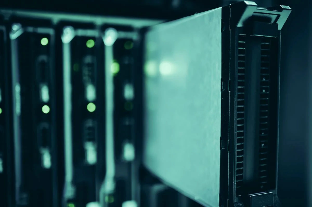Close view of server racks in a data center.