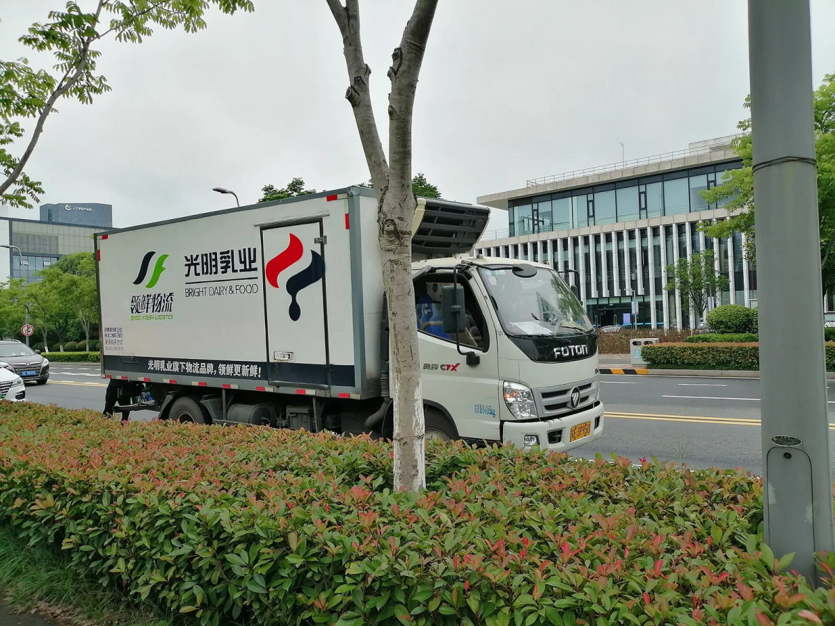 A delivery truck shown as logistics context.