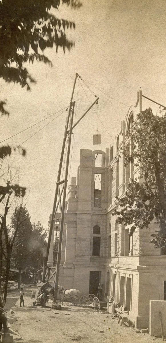Building of the Butler County Courthouse, Hamilton, Ohio (approximately 1885) - DPLA - b99f7f6119101d8495338e9b09d51ffd; a courthouse shown as legal-institution context.