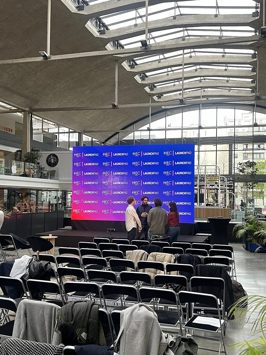 Founders presenting at the HEC Paris Startup Launchpad Demo Day at Station F in 2024.