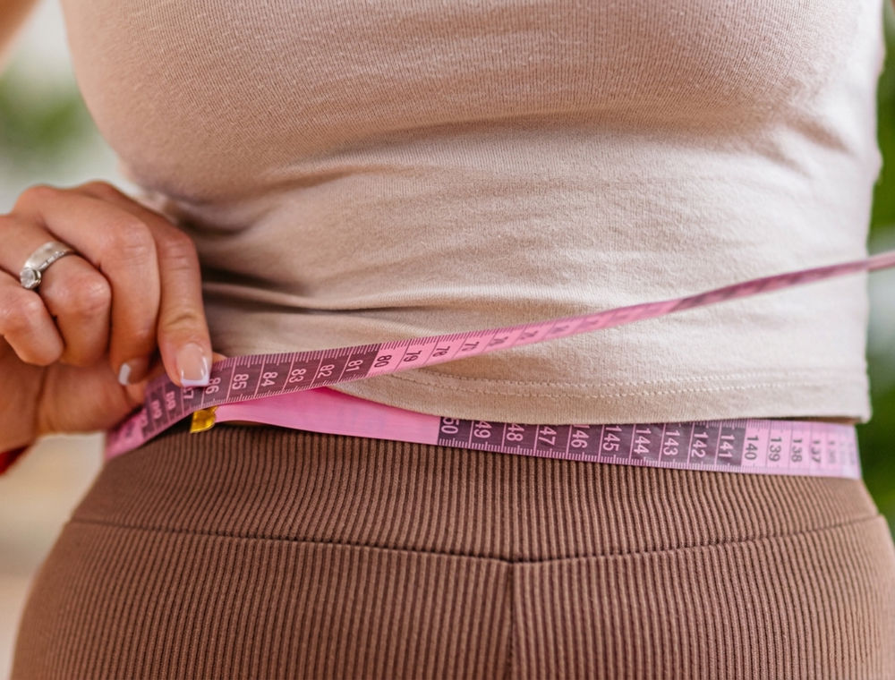 Measuring waist, progress and confidence