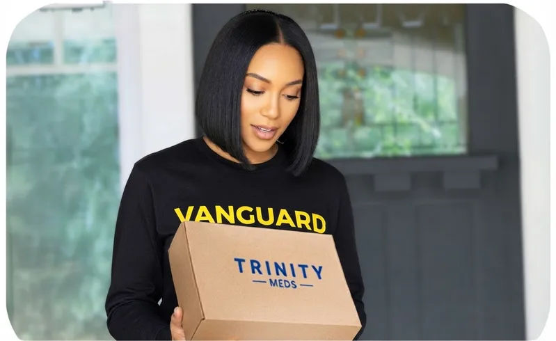 Patient receiving a Trinity Meds package at their front door